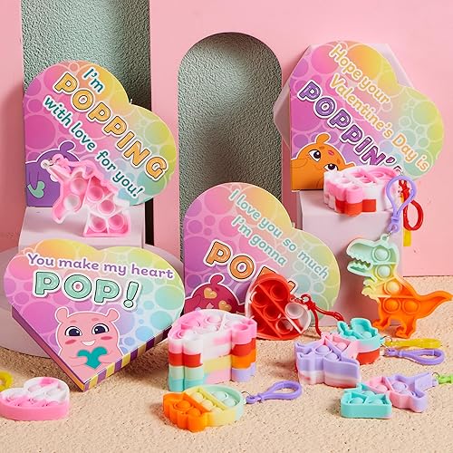 Miniatura 9 de JOYIN 24 llaveros para el día de San Valentín para niños, con cajas de corazón de San Valentín, juguetes para aliviar el estrés de burbujas para
