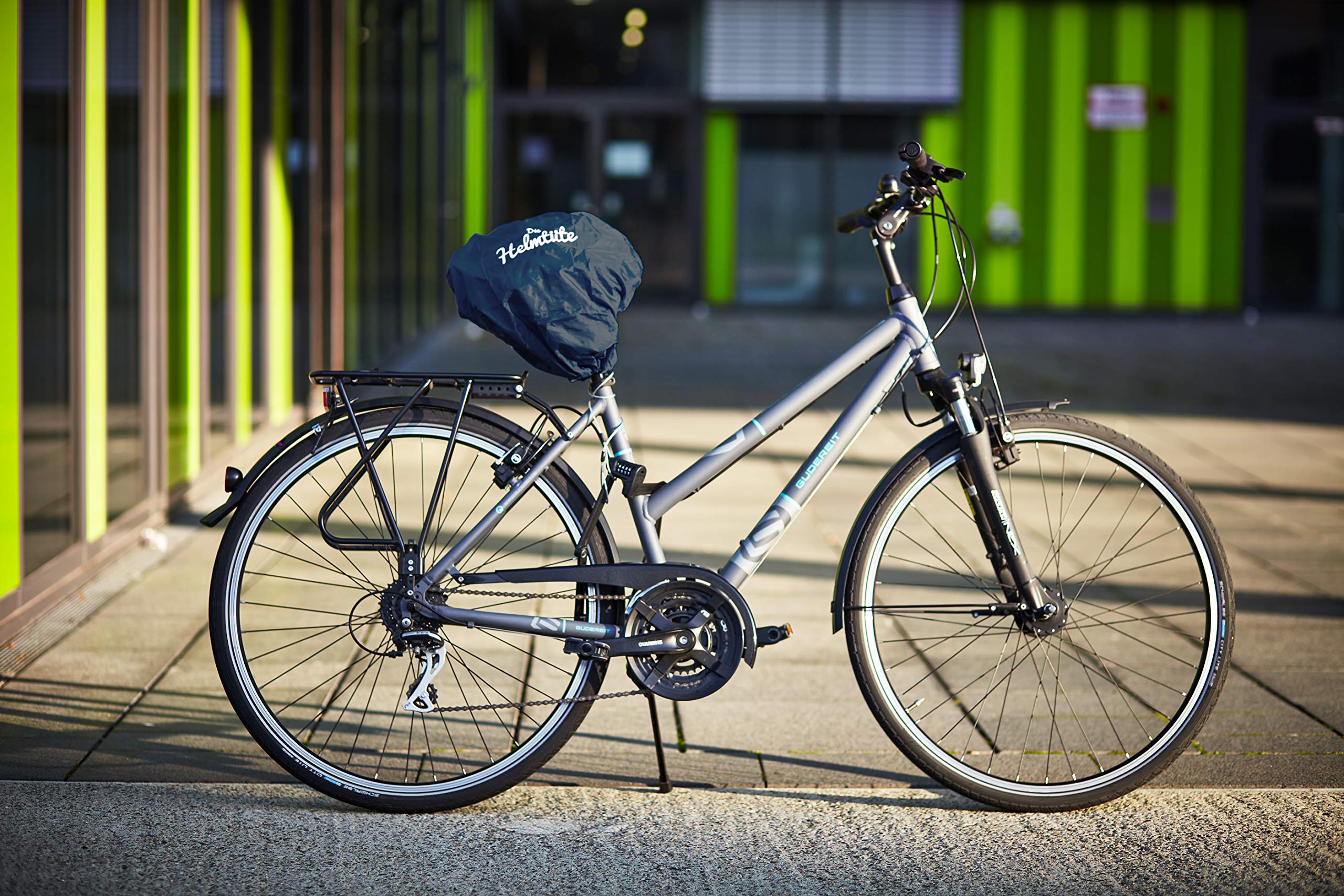 wasserdichte Helmtasche mit Diebstahlschutz; Fahrradhelm einfach am Rad verstauen, Helmschutz & Sattelschutz in einem - auch als Einkaufstasche nutzbar.