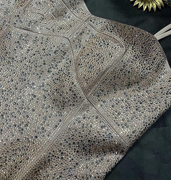 Luxury detail close-up of rhinestone slim fit gown.