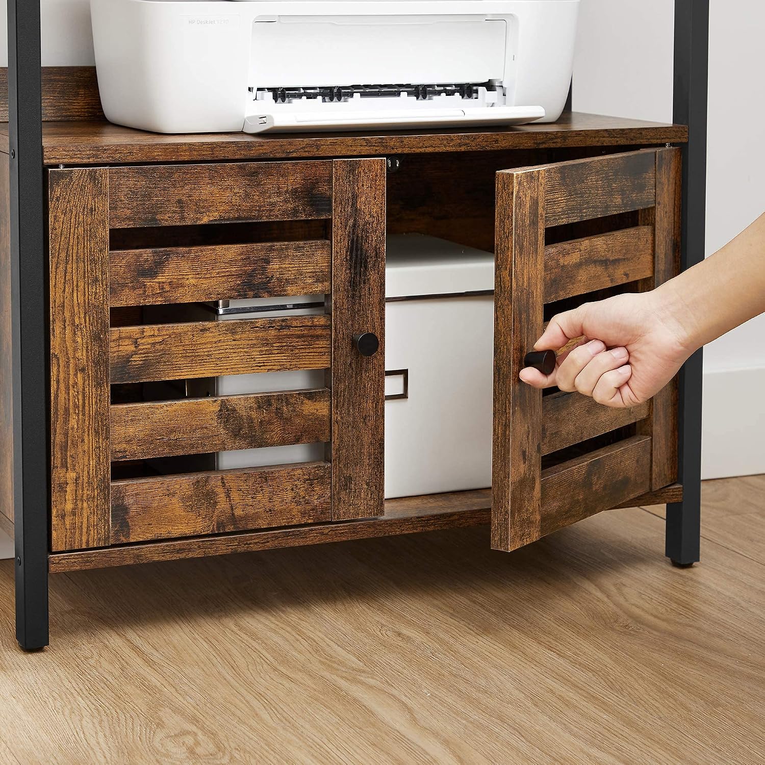 Close-up of the slatted doors on the lower cabinet of the VASAGLE LSC601B01, with one door partially open revealing storage space.
