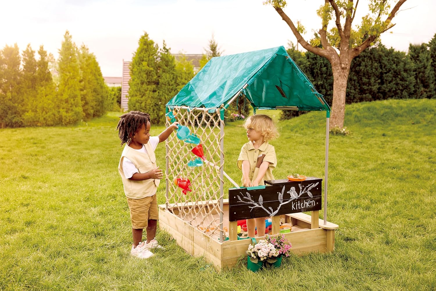 Hape All-in-one Sandbox Cabana Kit | Garden Sand Pit with Waterproof Sunshade, Activity Table, Water Play Station, Roleplay Kitchen and More | Outdoor Sandpit with Garden Toys