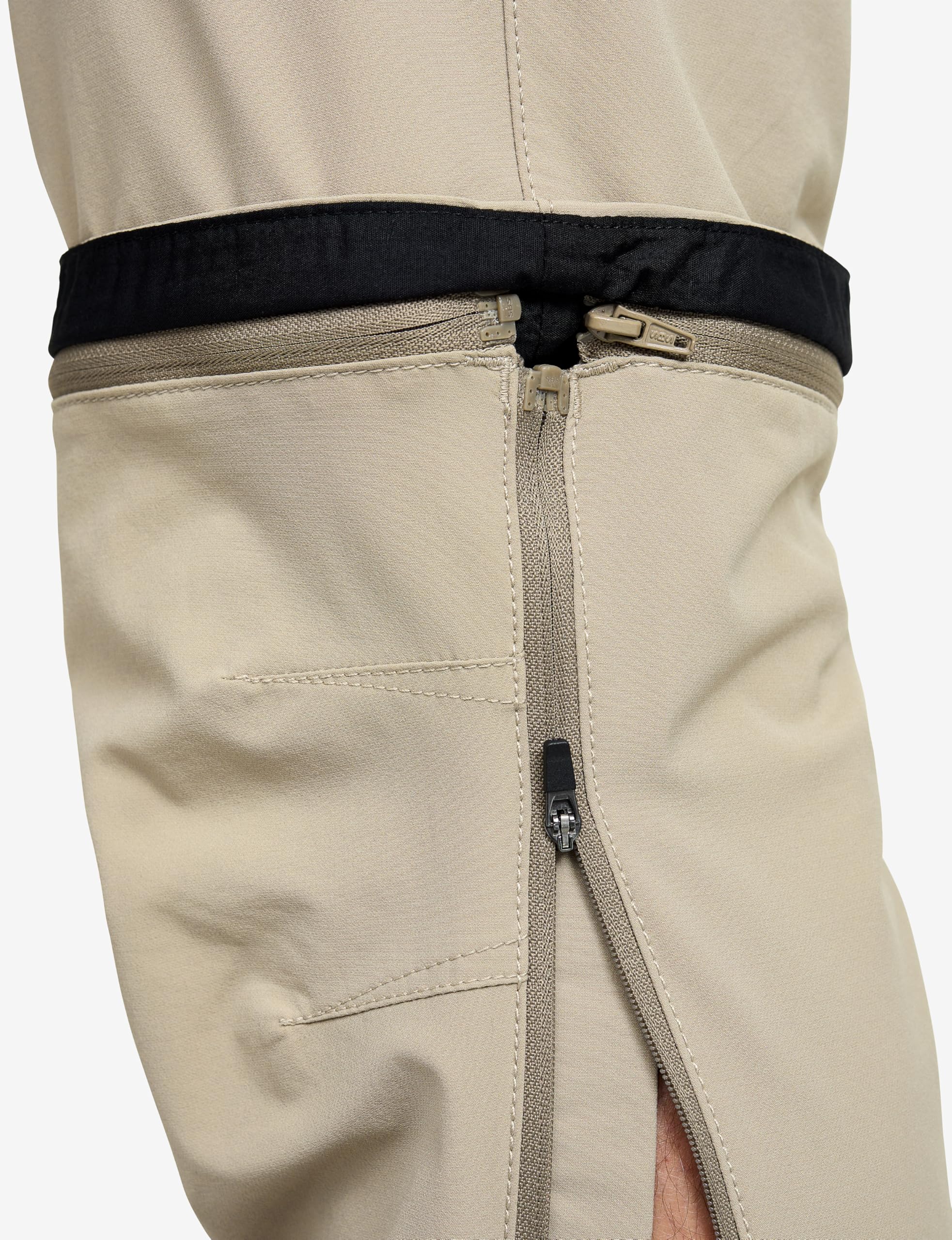 RevolutionRace Range Pro Stretch T Zip-Off Pants pour Homme, Pantalon de Randonnée Convertible pour Les Activités en Plein Air