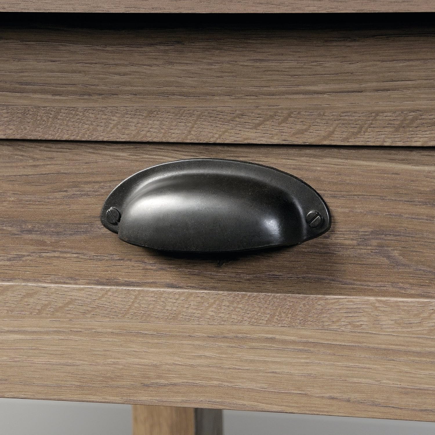 Close-up of the drawer pull on the Sauder County Line Side Table.