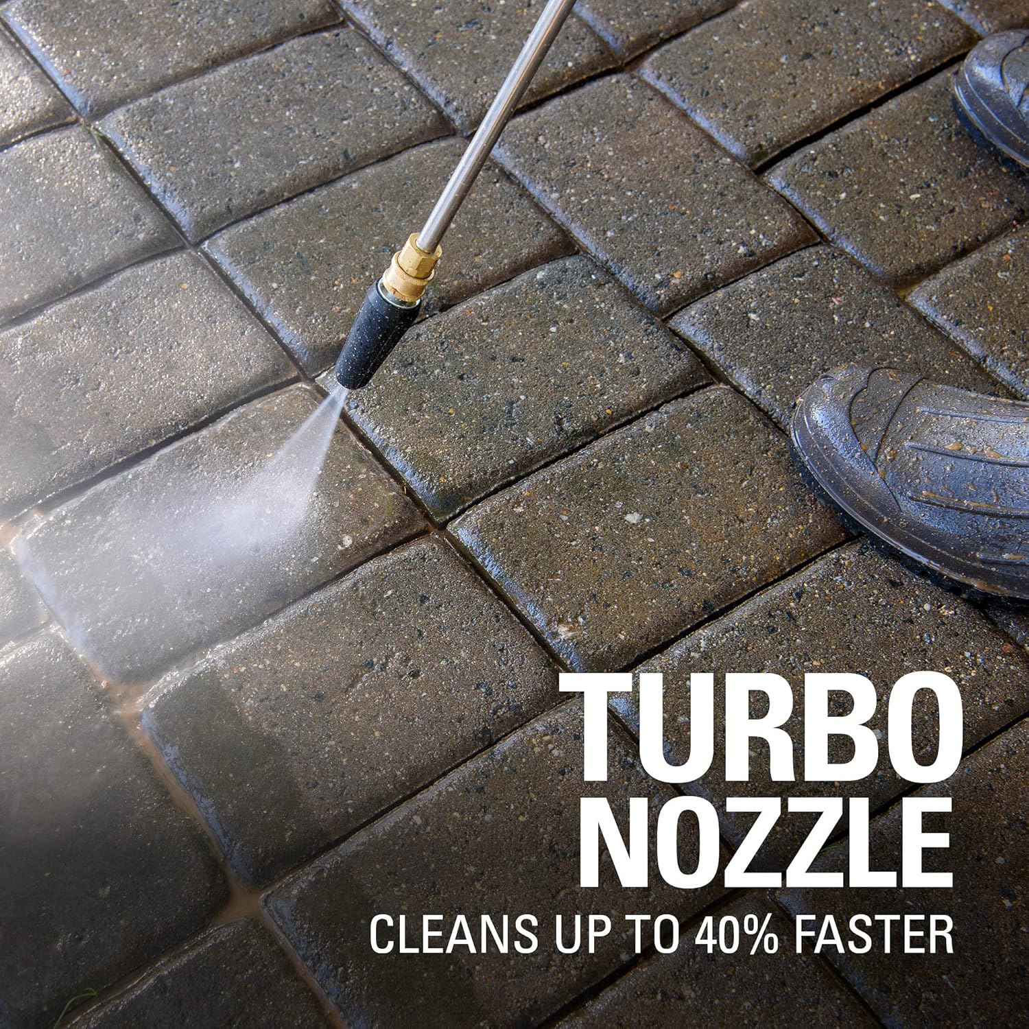 Close-up of the turbo nozzle cleaning a paved surface