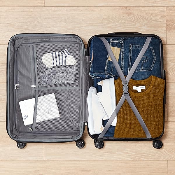Amazon Basics Bagage de Cabine Extensible Rigide - Bagage de Voyage en ABS avec 4 Doubles Roues Rotatives - Structure Légère et Anti-Rayures - 37,5cm x 25,5cm x 55,0cm - Bleu Marine - 3