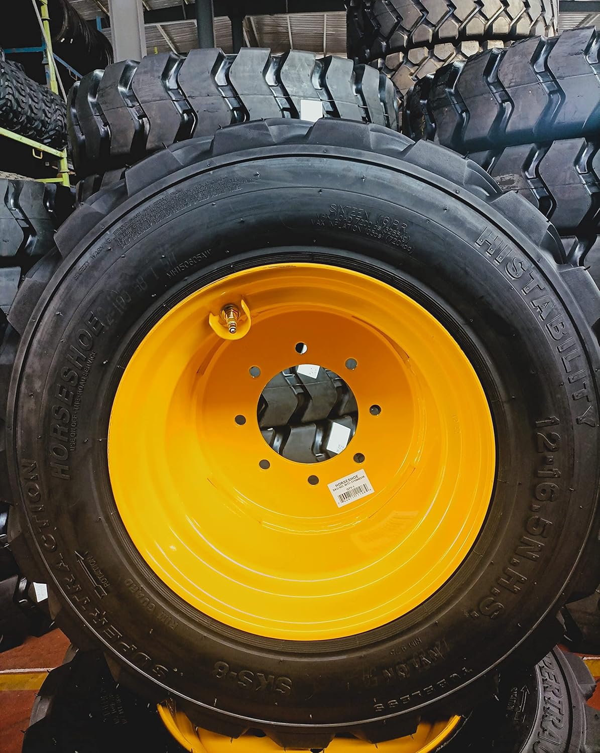 HORSESHOE 12-16.5 16PLY R4 Extra Thick Rim-Guard Wall Super Heavy Duty LRH Tire mounted on 16.5x9.75 Tan Steel rim w/Brass Valve Stem & Stem Protector for Left or Right 12X16.5 16.5x9.75 (Right Side)