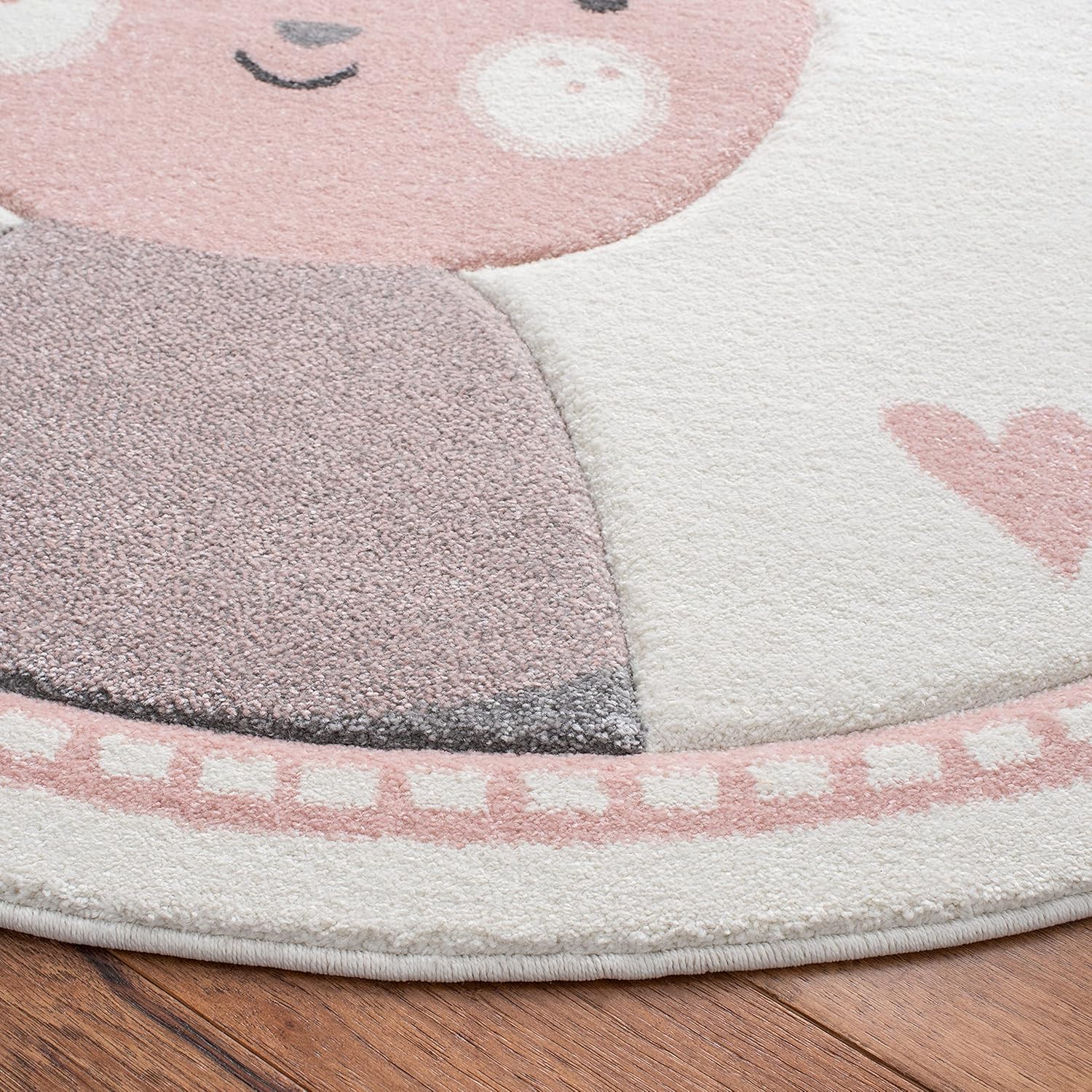 SAFAVIEH Carousel Kids Collection Area Rug - 5'3" Round, Ivory & Pink, Bunny Design, Non-Shedding & Easy Care, Ideal for High Traffic Areas for Boys & Girls in Playroom, Nursery, Bedroom (CRK166A)