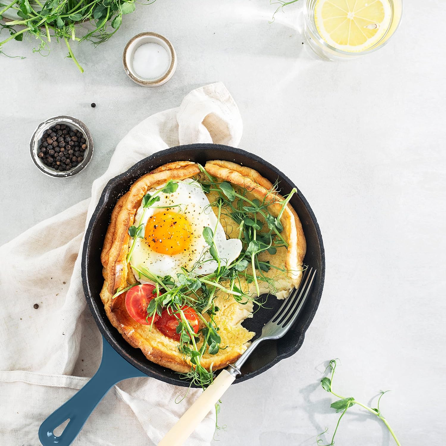 Breakfast Served in a Teal Cast Iron Pan