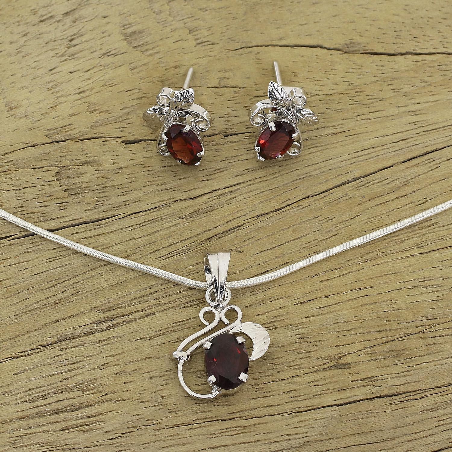 NOVICA Artisan Handmade Garnet Jewelry Set Floral in Sterling Silver Rhodium Plated Red Pendant India Birthstone [15.75 in L Pendant(s) 0.4 in L x 0.2 in W Earrings 0.4 in L x 0.2 in W x 0.2 in D] '