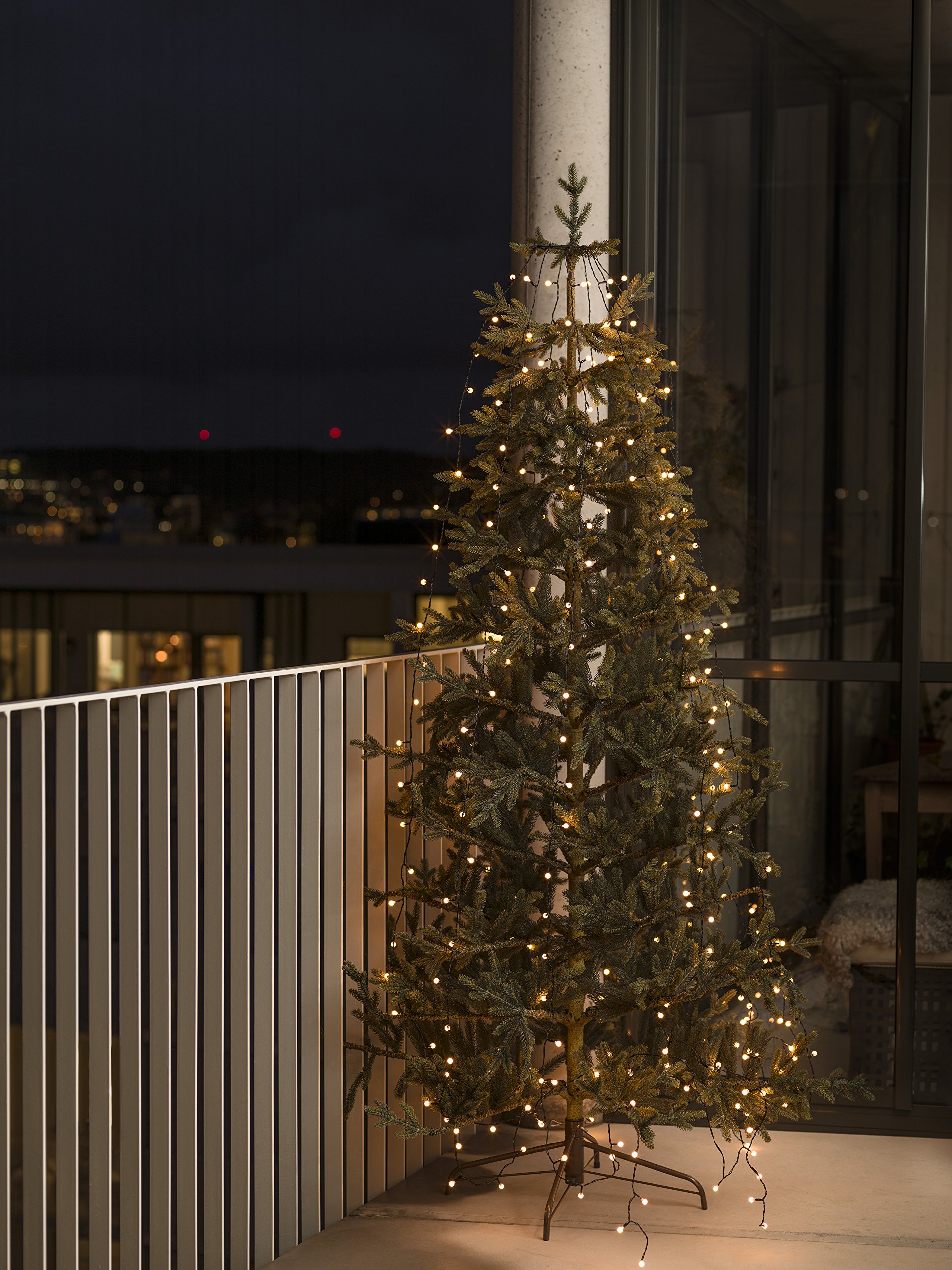 Konstsmide LED Baummantel mit Ring Ø 17, mit Globes, 8 Stränge à 70 Dioden, vormontiert, 560 bernsteinfarbene Dioden, 24V Außentrafo, schwarzes Kabel - 6329-800