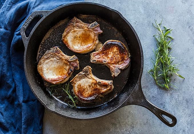 The LODGE MFG L10SK3 Lodge Logic skillet is a versatile piece of cookware designed for both novice and professional cooks. Featuring a 12-inch diameter and a 2-inch depth, this cast iron skillet is ideal for a variety of cooking techniques, including frying, sautéing, baking, and even oven roasting. Its robust construction ensures excellent heat retention and even heating, which are hallmarks of cast iron cookware, allowing for precise temperature control.