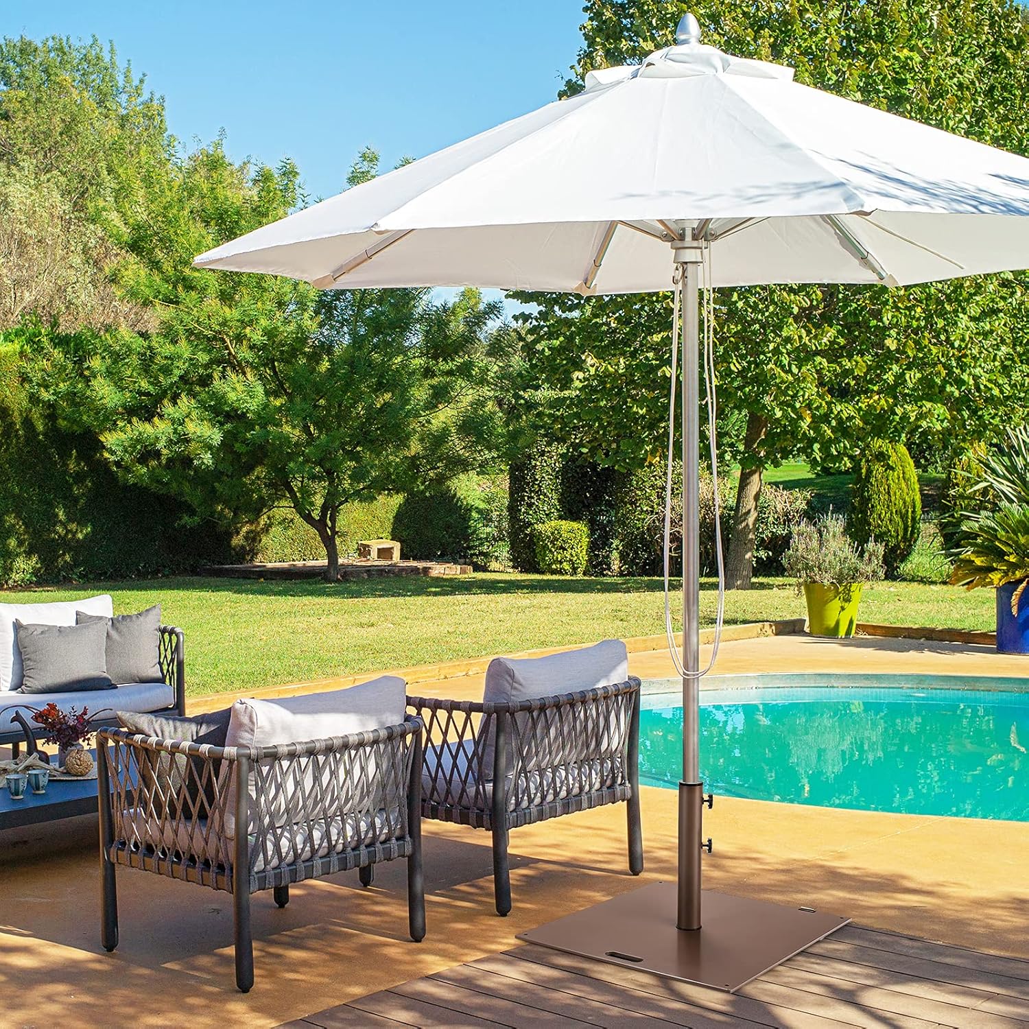 Sturdy & Portable: Tangkula 50LBS Umbrella Base Review for Your Outdoor Oasis