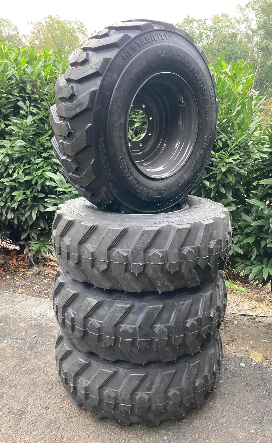 Set of 4-14X17.5 Forerunner SKS-1 Skid Steer Tires on Gray Wheels/Rims (8 lug) for Case, New Holland & more (4.13" Back Spacing) -14PLY -14X17.5