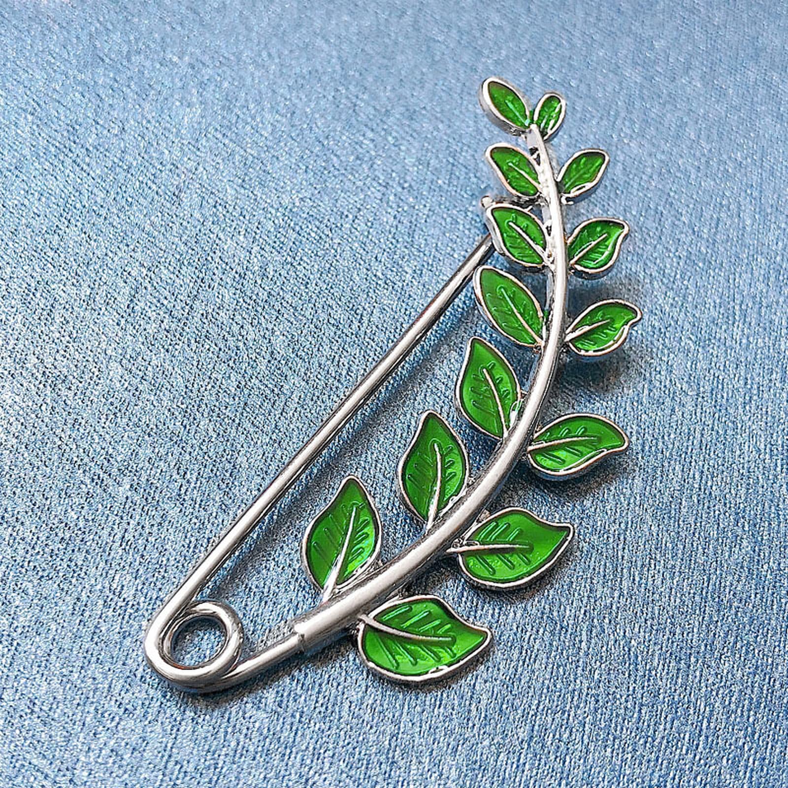 Broches émaillées en feuilles d'un raffinement rétro et minimaliste