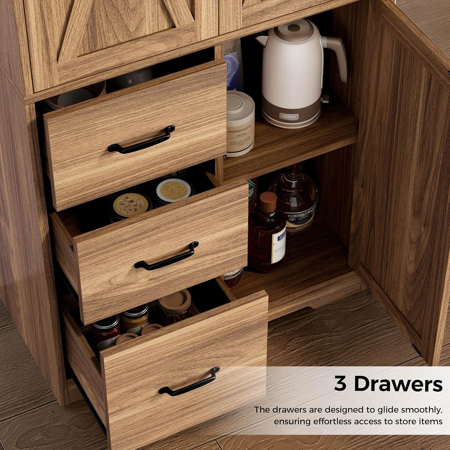 Close-up view of the three drawers of the pantry cabinet, with one drawer partially open revealing items inside.