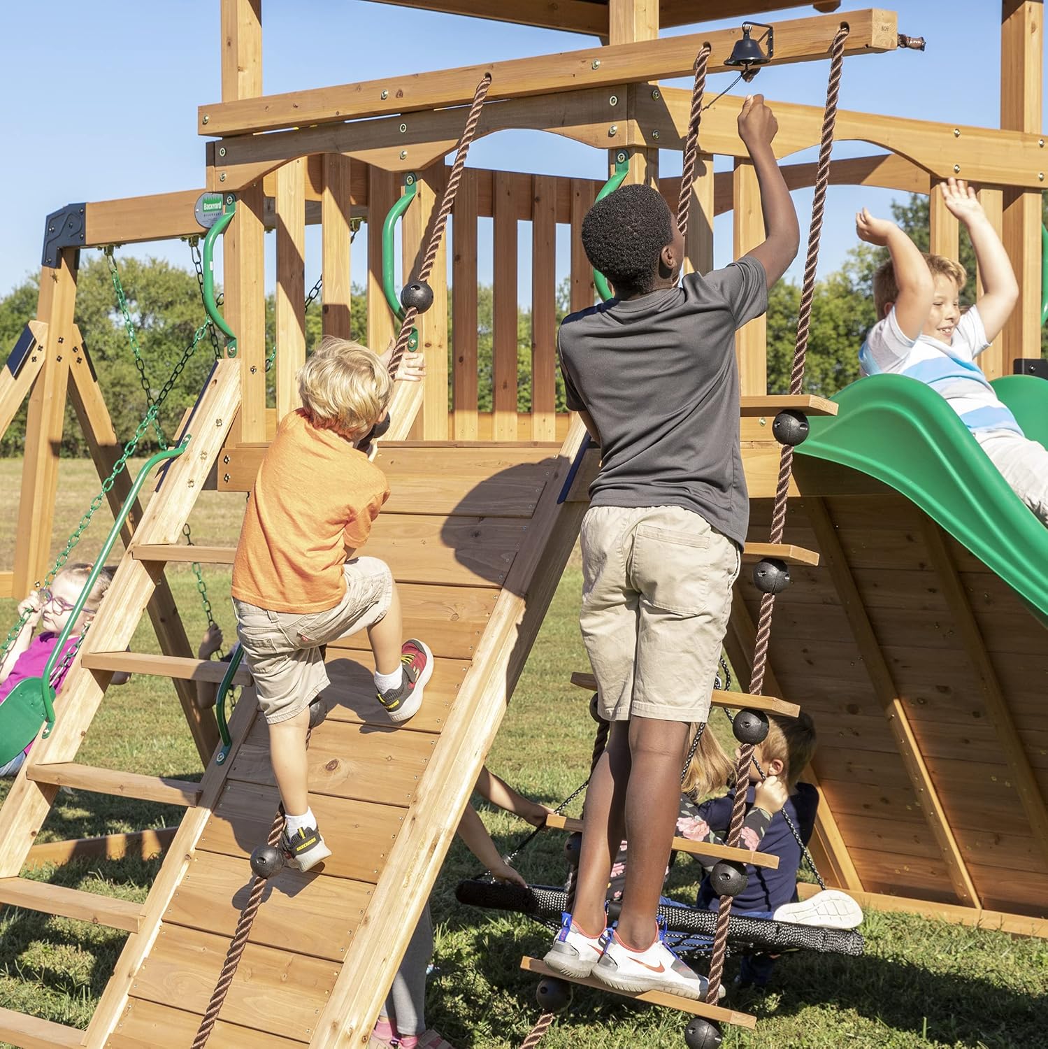 Backyard Discovery Endeavor All Cedar Wood Swing Set Playset for Backyard with Large Clubhouse Wave Slide Rope Ladder Rock Climbing Wall Wave Slide 2 Belt Swings and 1 Web Swing Gift for Ages 3-10 : Toys & Games