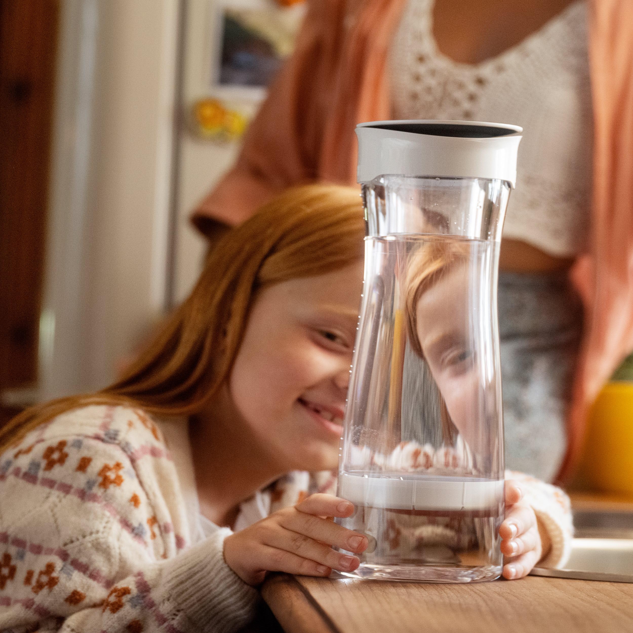 BRITA Bottiglia filtrante, bianca (1,3L) incl. 1 filtro MicroDisc: riduce PFAS, cloro, microparticelle e altre impurità