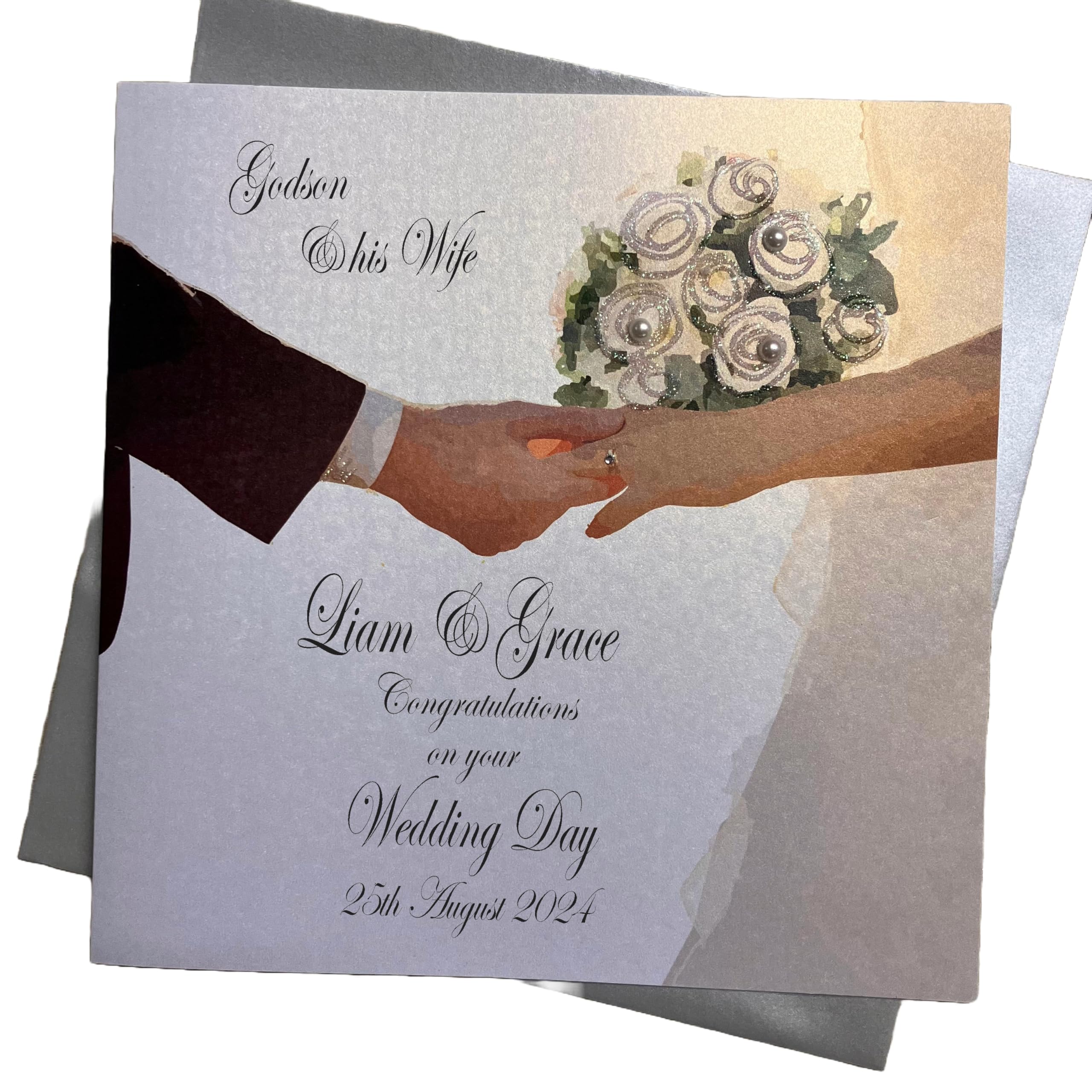 WHITE COTTON CARDS PERSONALISED WEDDING CARD. GODSON & HIS WIFE. HANDS & WHITE FLOWERS DESIGN. HAND FINISHED (P24-25-GODS)