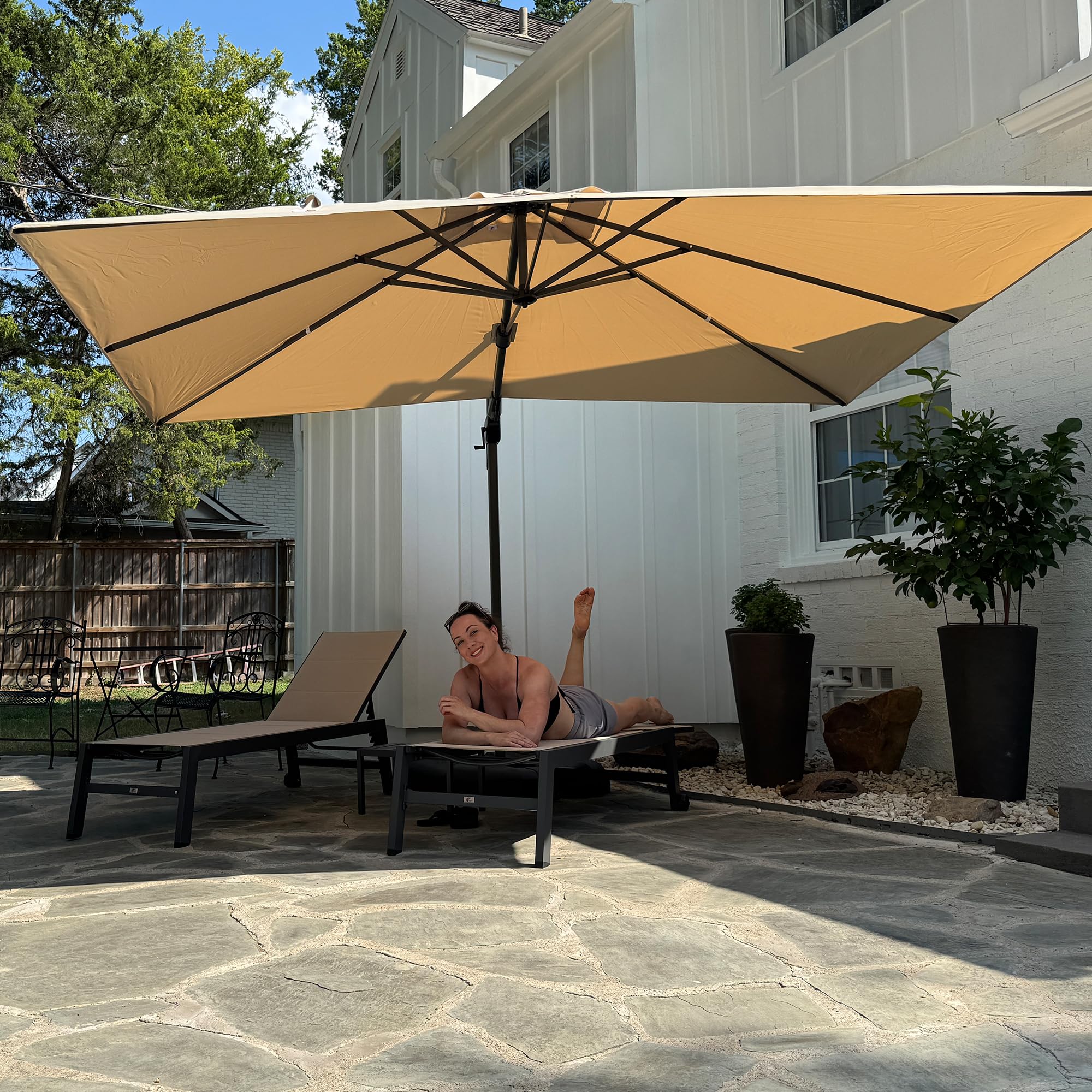 PURPLE LEAF 8.2' X 11.5' Left-right Tilting Patio Umbrella in a patio setting
