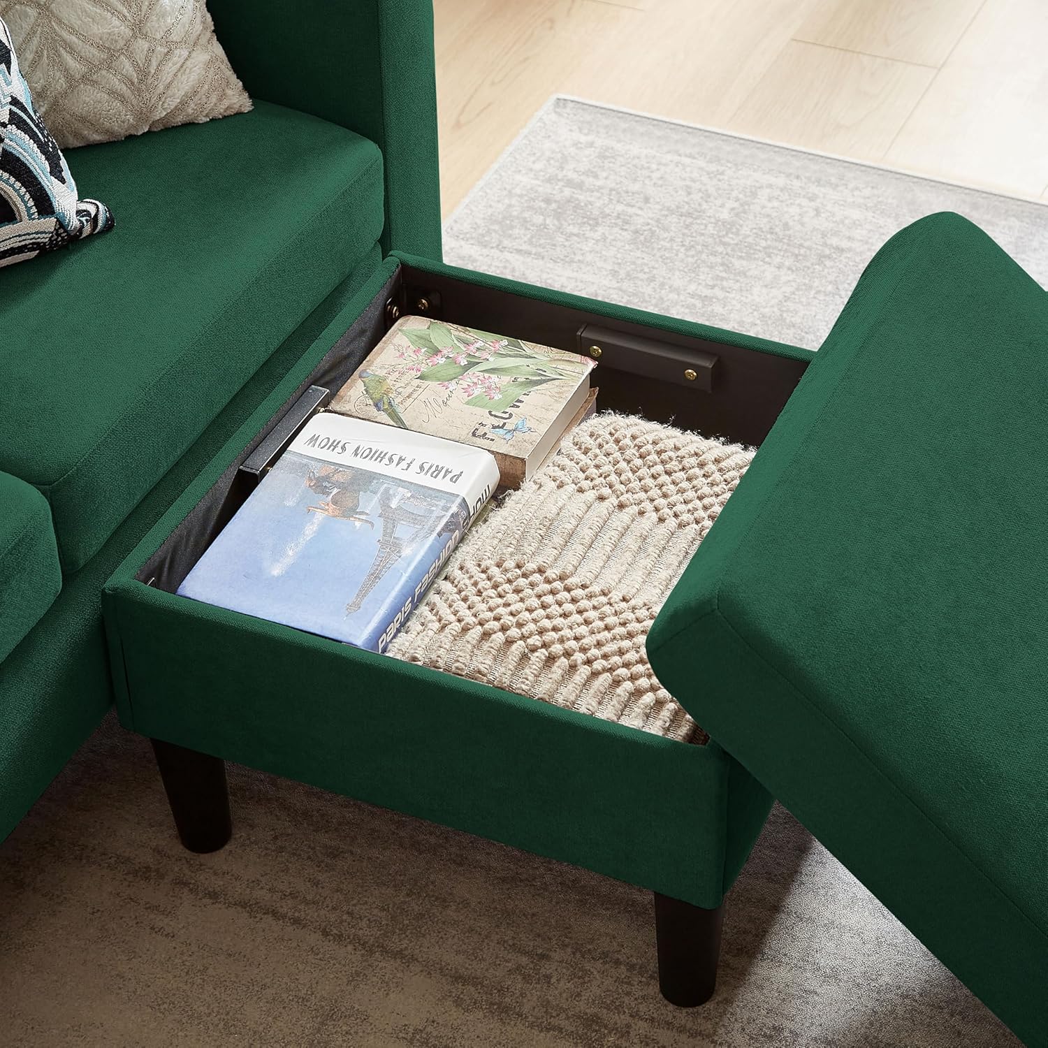 Open storage compartment of the movable ottoman for the Soscana sectional sofa