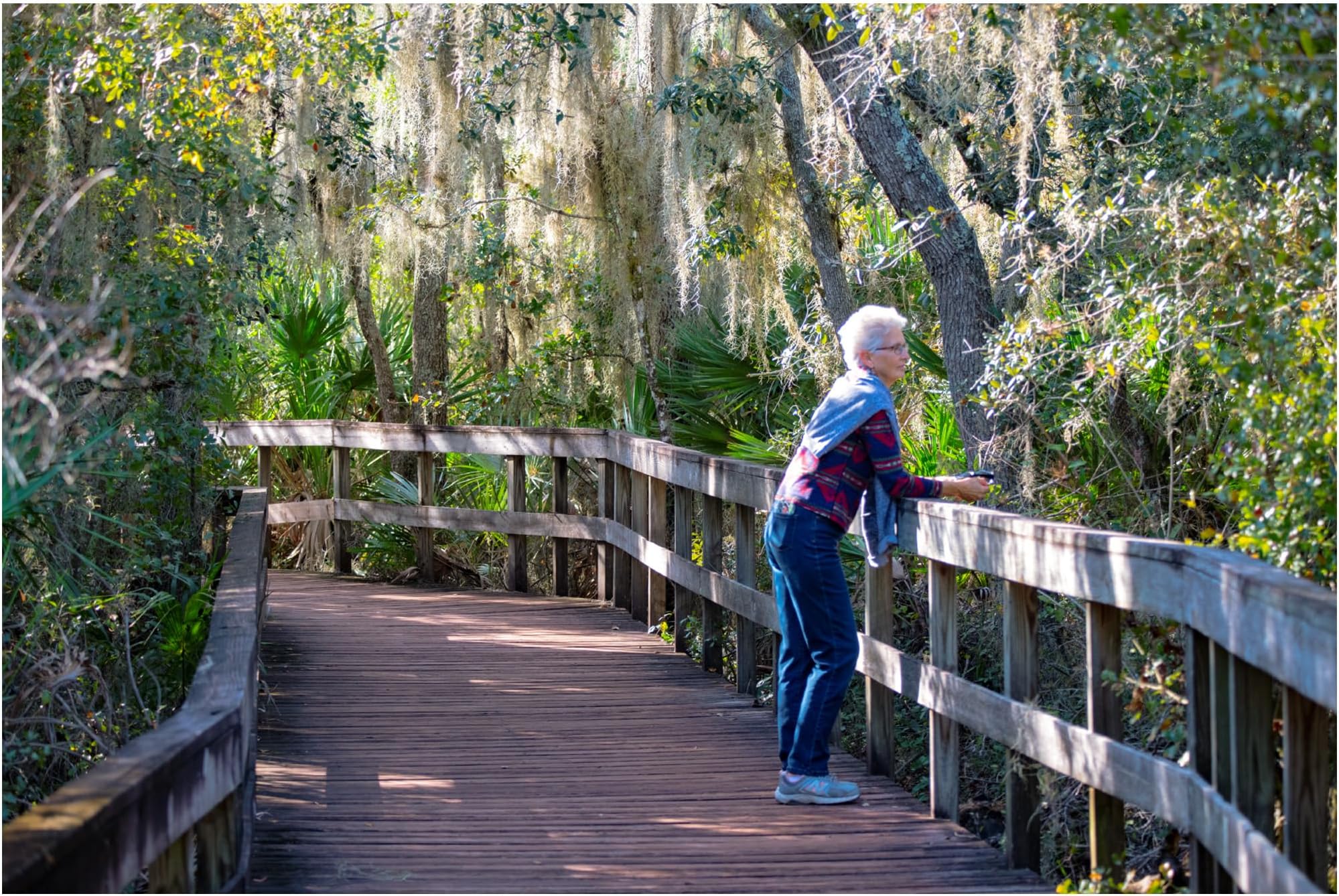 Robert Michaud 'Senior On Boardwalk' Canvas Art