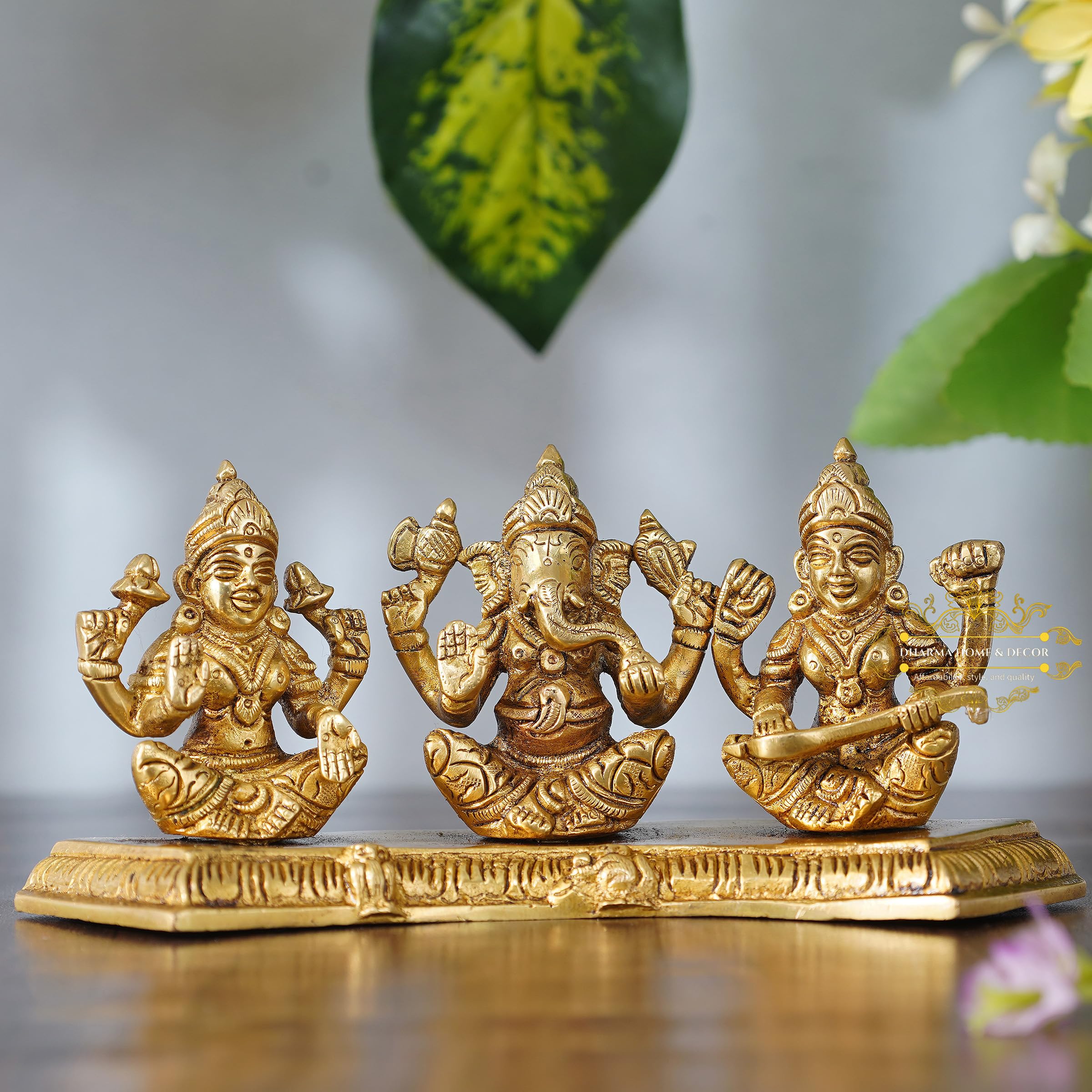 Dharma Home & Decor Brass Laxmi Ganesh Saraswati Idol | Ganesha Statue | Ganpati Murti | for Home Decor | Gift | (Gold) (weight 1218 g) (L 8 X W 2.2 X H 3.8 Inch).