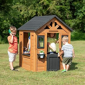 Backyard Discovery Sweetwater Cedar Wooden Kids Playhouse Cottage with Play Kitchen, Snack Bar, Half Door, Toy Phone, Windows, Flowerpot Holders, and Working Doorbell for Outdoor Imaginative Play