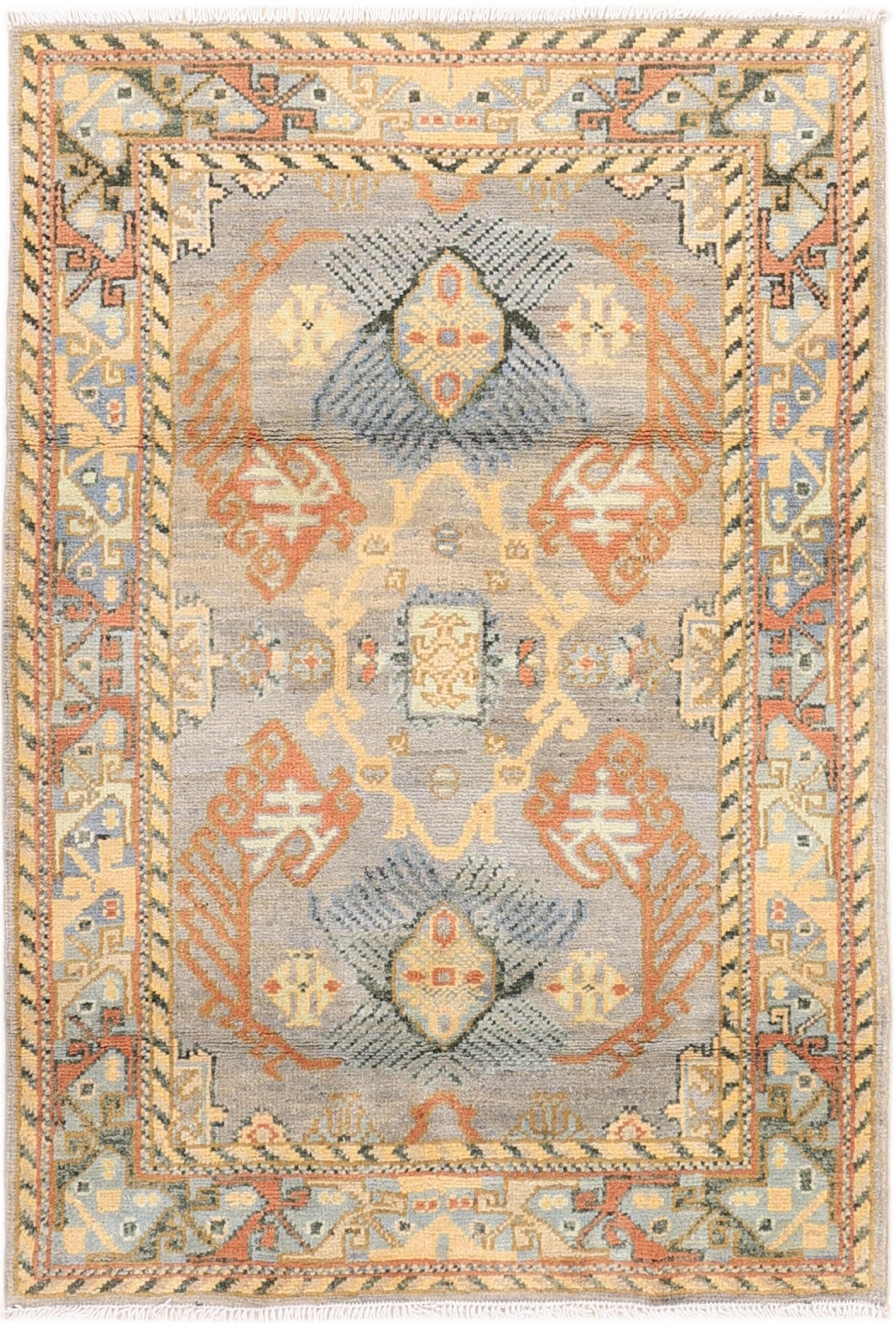 Tapis Kazak d'Orient fait main pour transmettre l'histoire de la laine