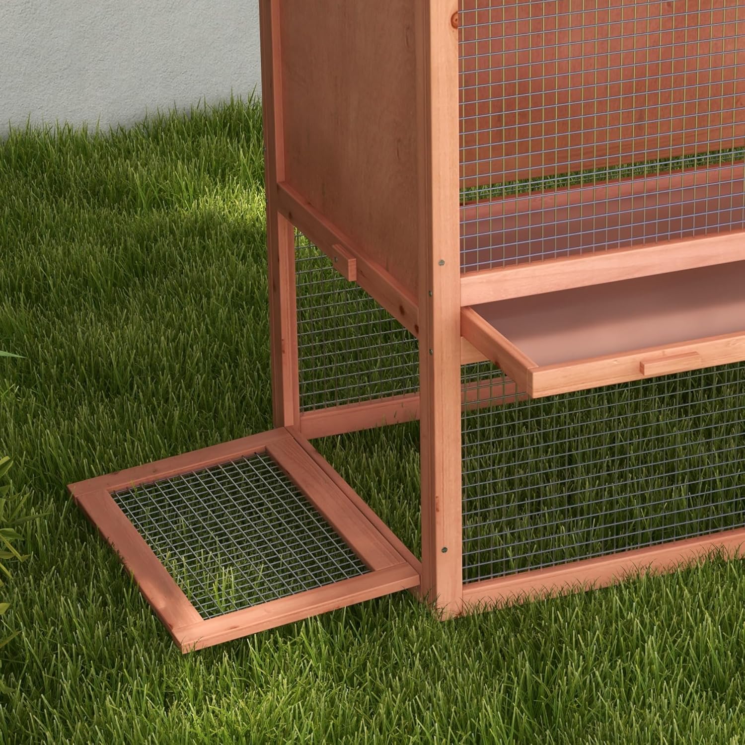 Close-up of the bottom access door of the PawHut D51-121 rabbit hutch