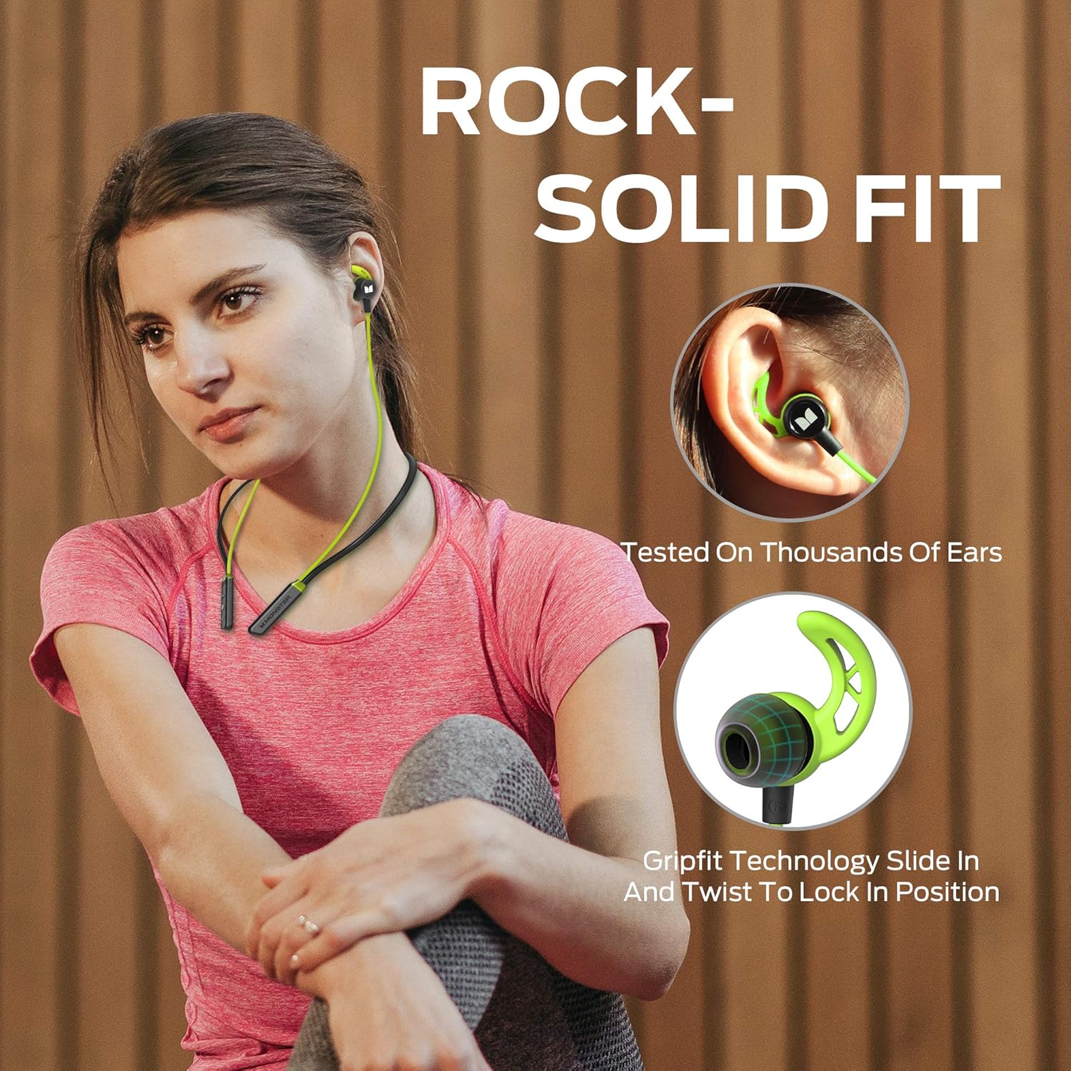 Woman wearing Monster iSport Solitaire Lite headphones with secure fit details