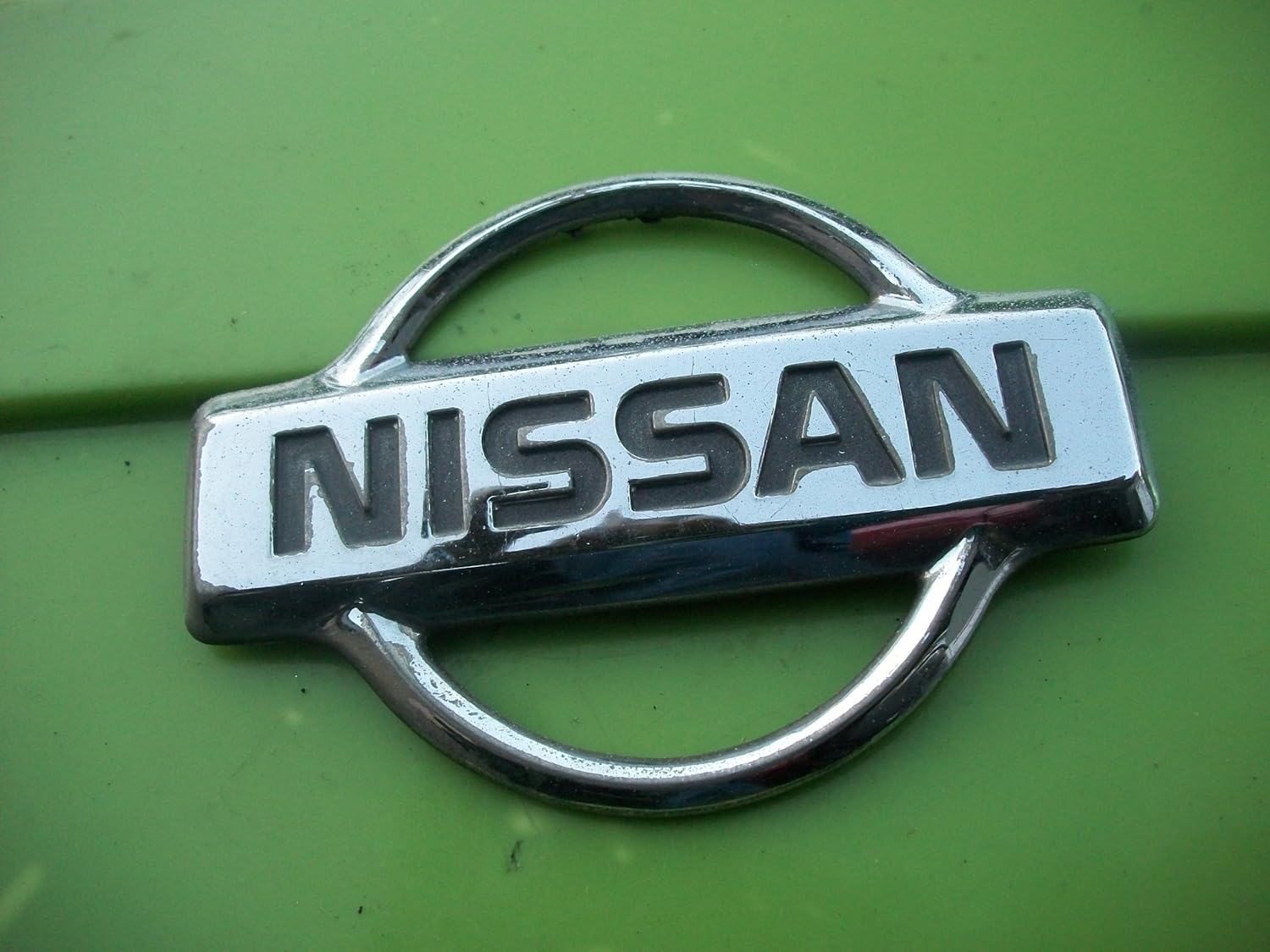 NISSAN MAXIMA REAR TRUNK SYMBOL EMBLEM F3XA16B621