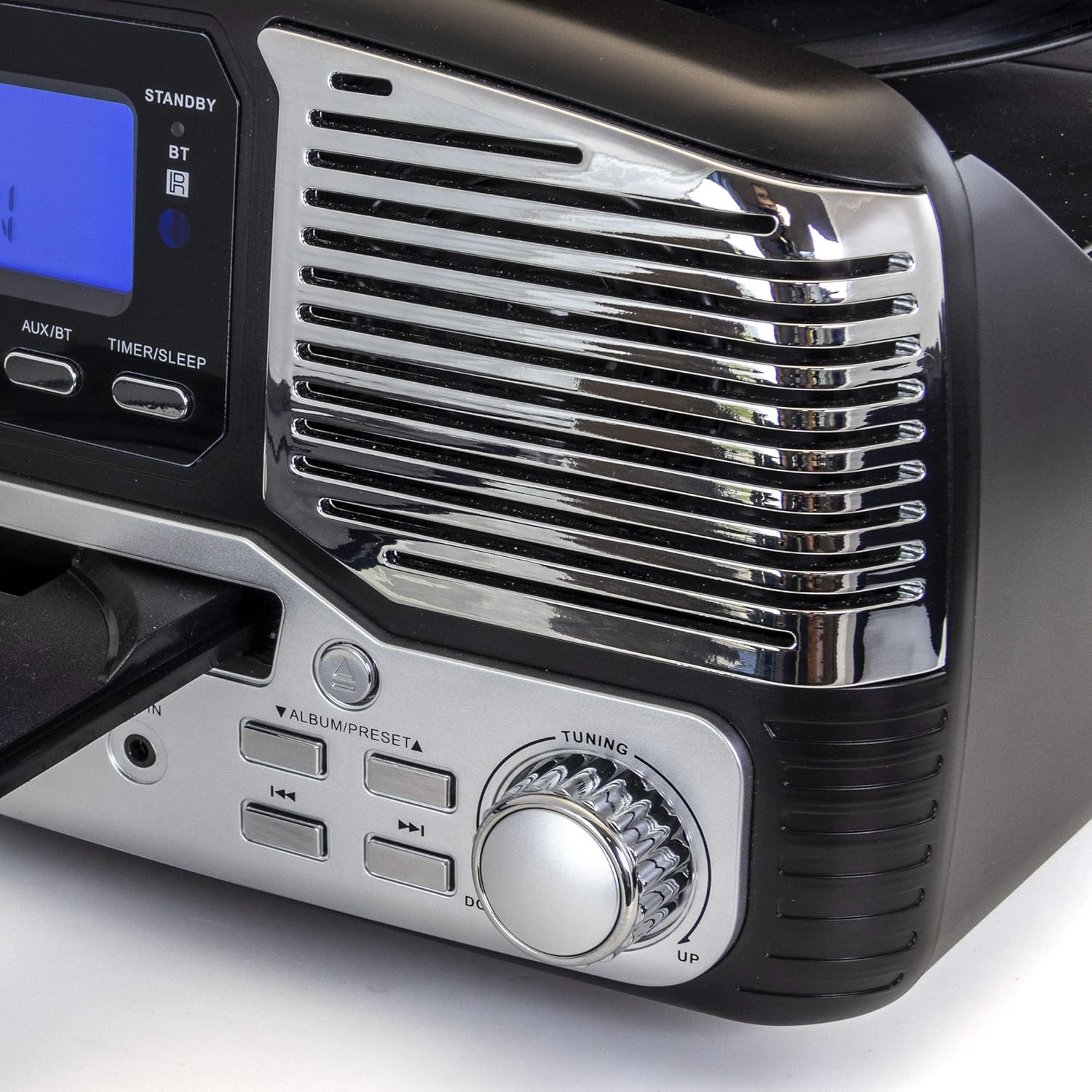 Close-up of the Trexonic Retro Record Player's tuning knob and playback control buttons.