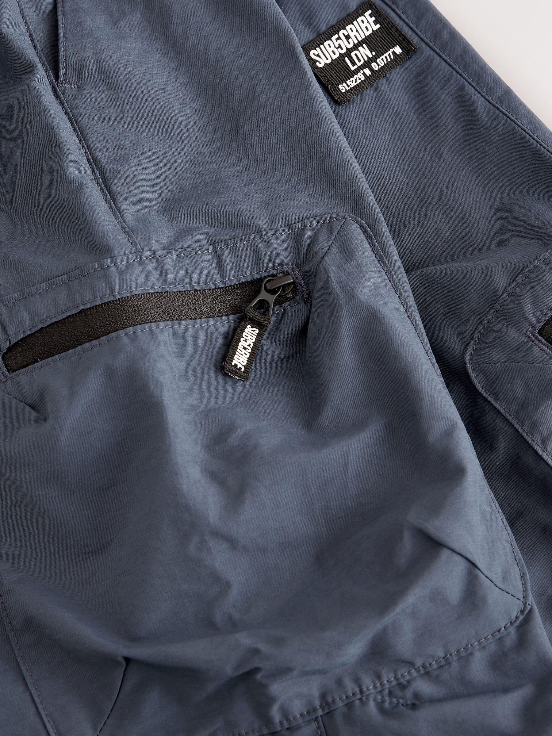 NEXT Niños Pantalones Cargo con Bolsillos con Cremallera