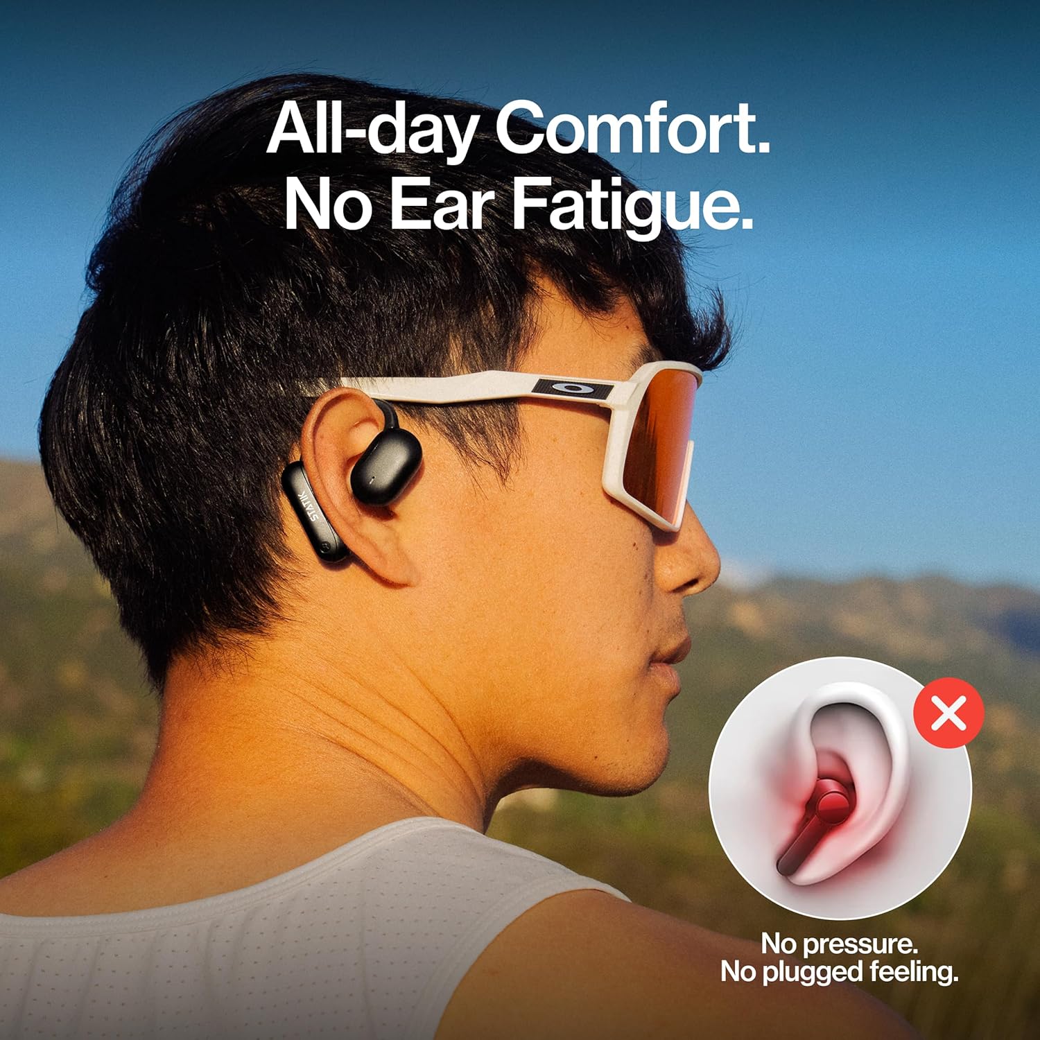 Person wearing Statik Aktive Open Ear Bluetooth Earbuds, illustrating comfortable fit