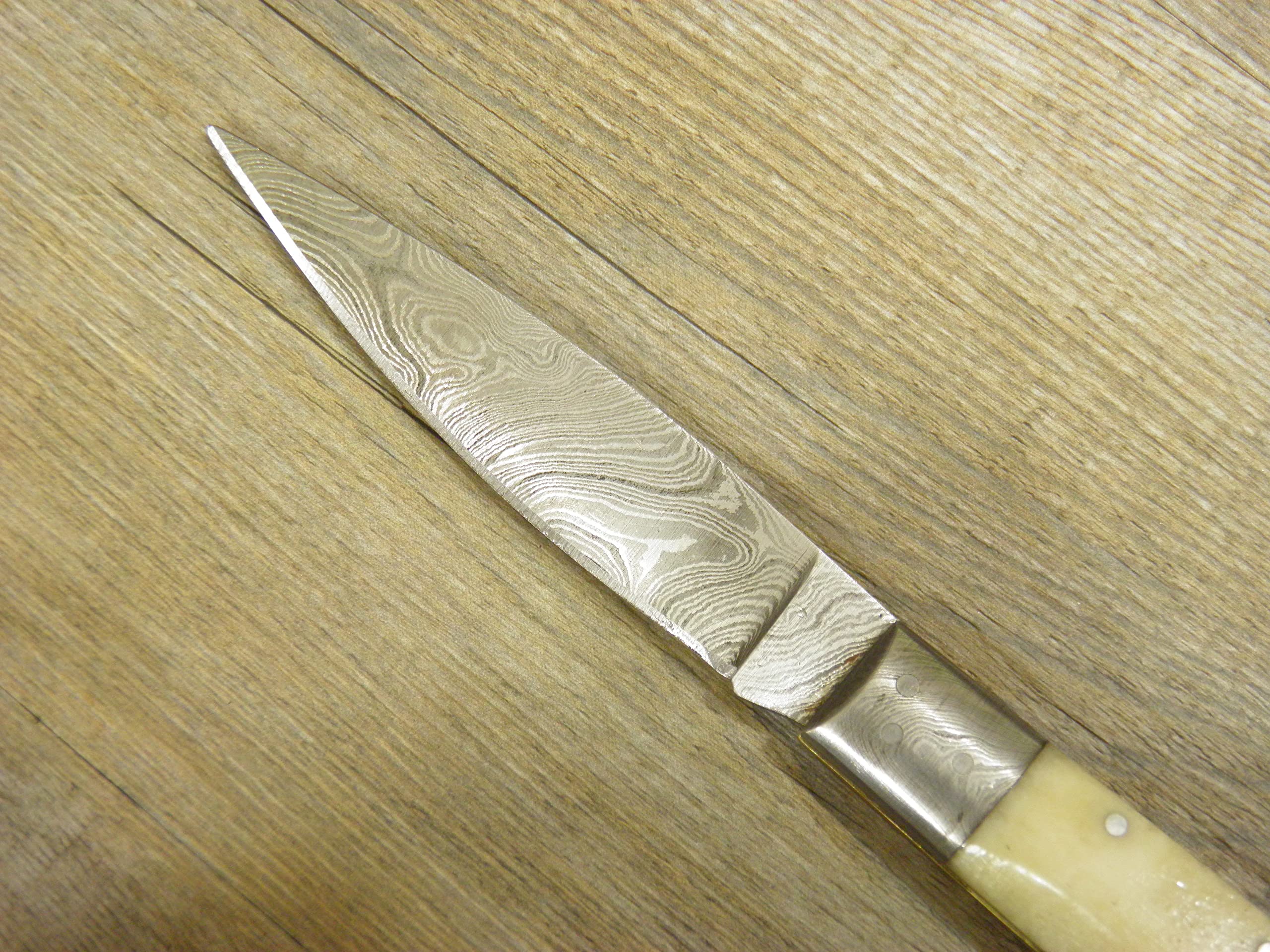 Coltello sardo Pattada Damasco Manico in osso di tibia 22 cm sardegna