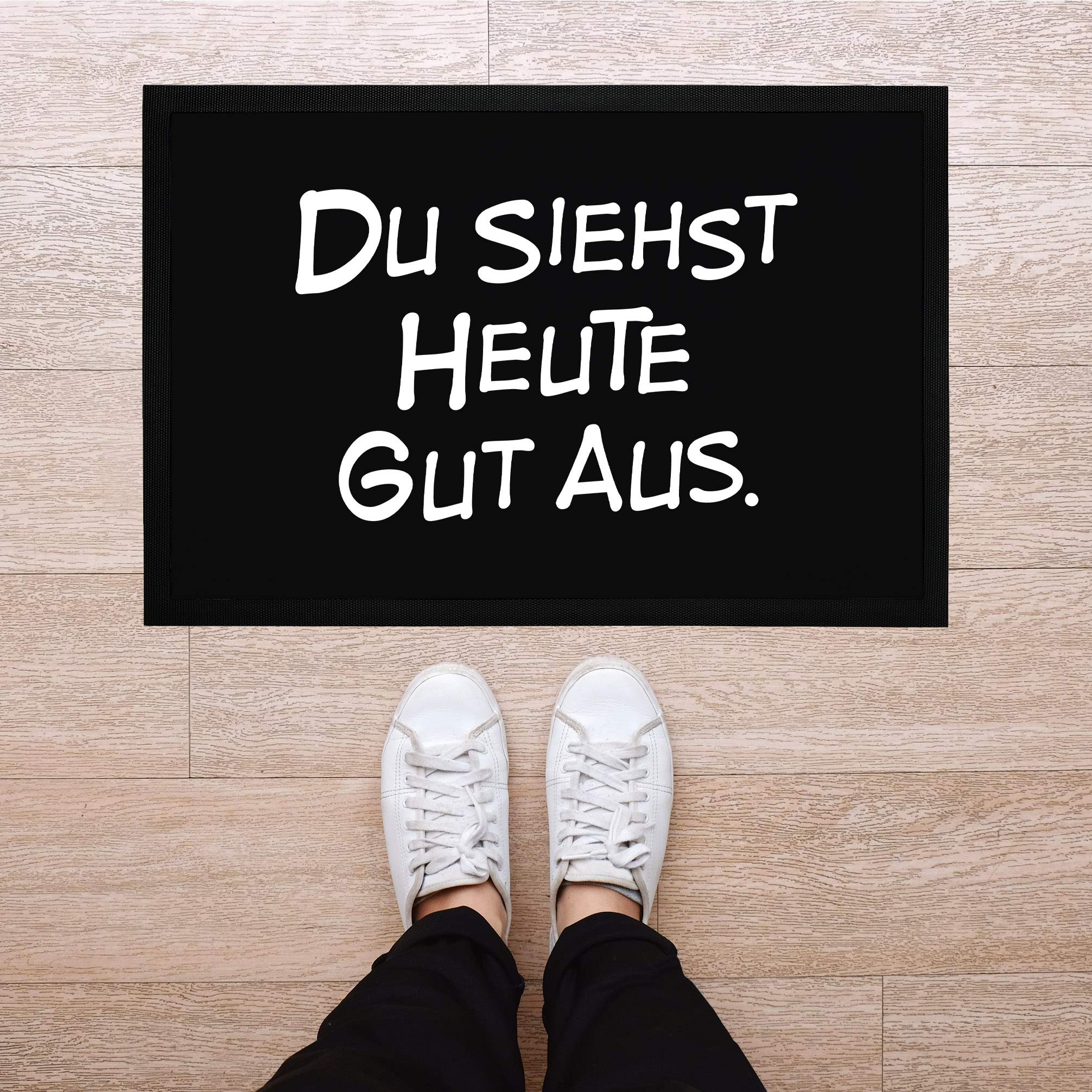 MoonWorks® Fußmatte 'Wie Schön DASS Du Da Bist' – Rutschfeste & Waschbare Schmutzmatte (60x40 Cm, Schwarz)