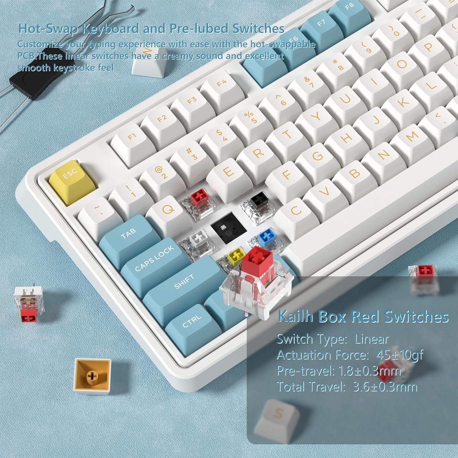 Close-up of the CMK98 keyboard demonstrating hot-swappable switches with a switch puller and individual switches.