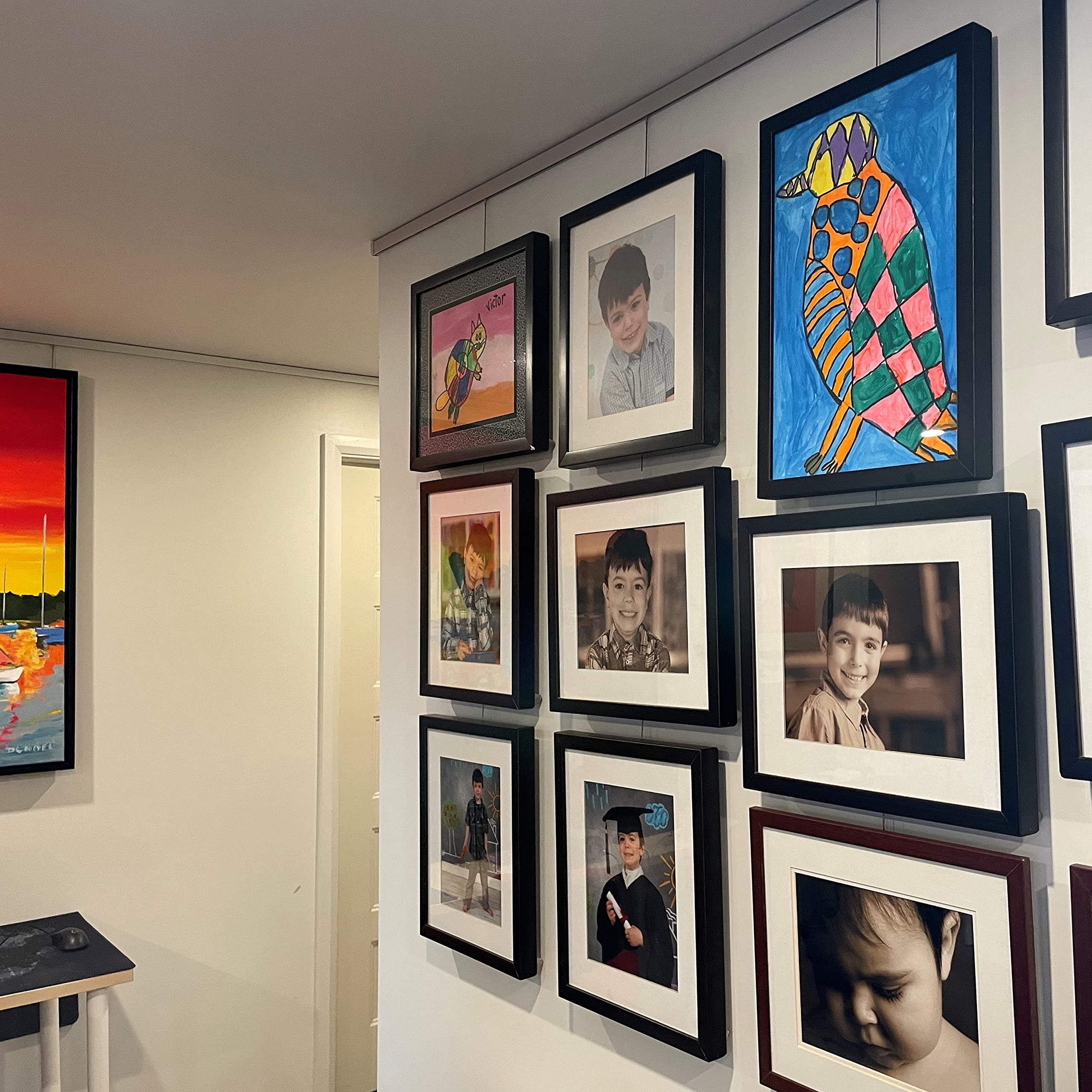 8-ft Picture Hanging System Kit, Complete set covers 8 linear ft of wall (2) Silver Click Rail Track (48-in), (4) Twist Steel Cables (48-in), (4) Gripper Hooks, (2) Rail Endcap & Installation Hardware