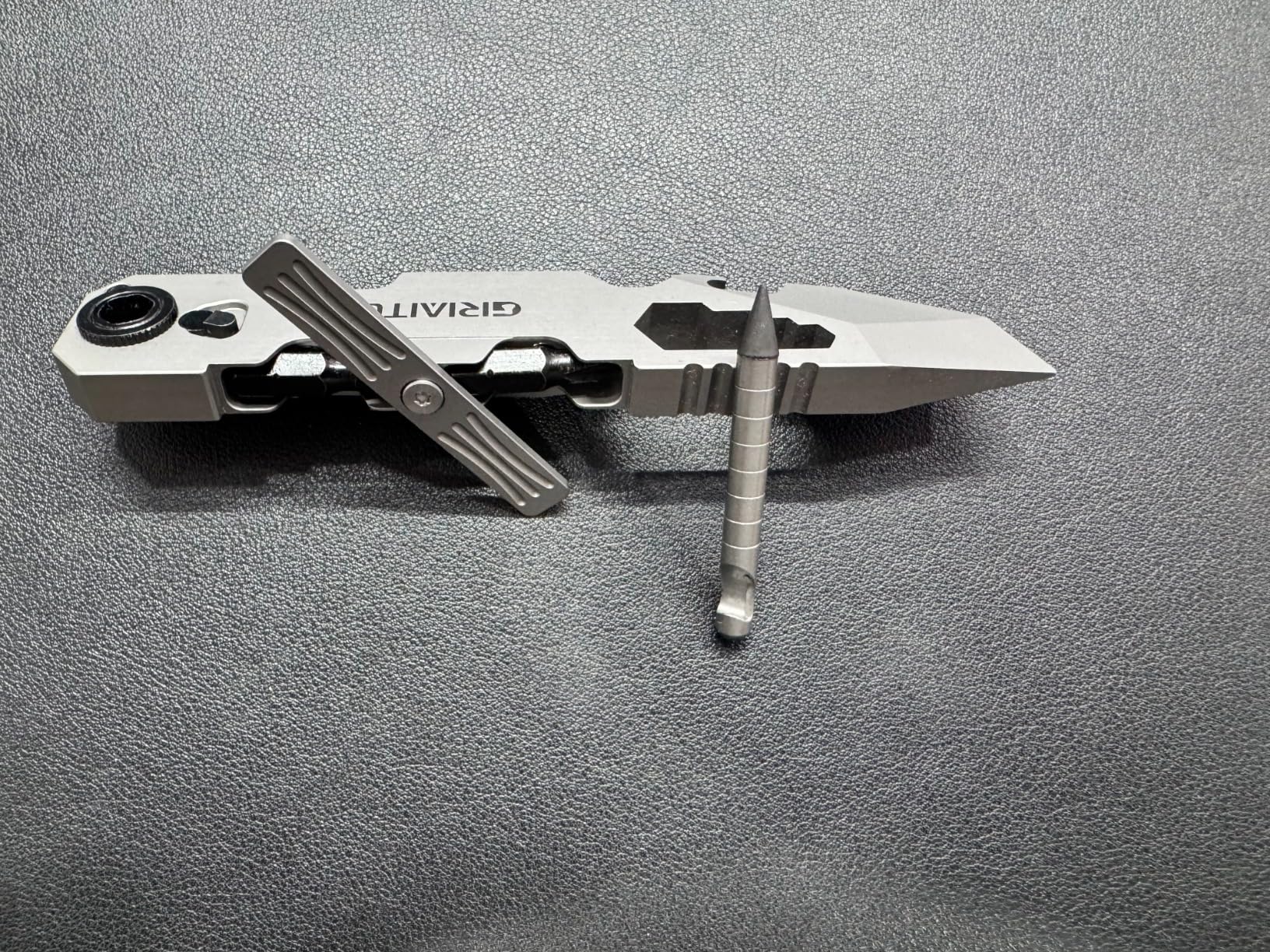 EDC Pry Bar Multitool next to a pencil for size comparison