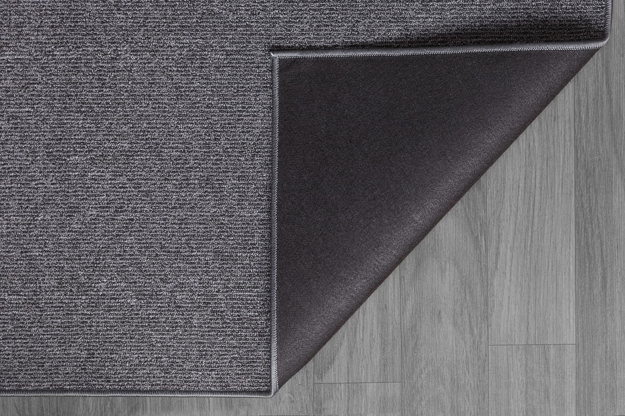 the carpet Natal Moderner einfarbiger Teppich Wohnzimmer, für die Küche geeignet, Tufting, robuster Kurzflor mit Filz-Rücken, weich & schmutzabweisend, Anthrazit, 200 x 290 cm