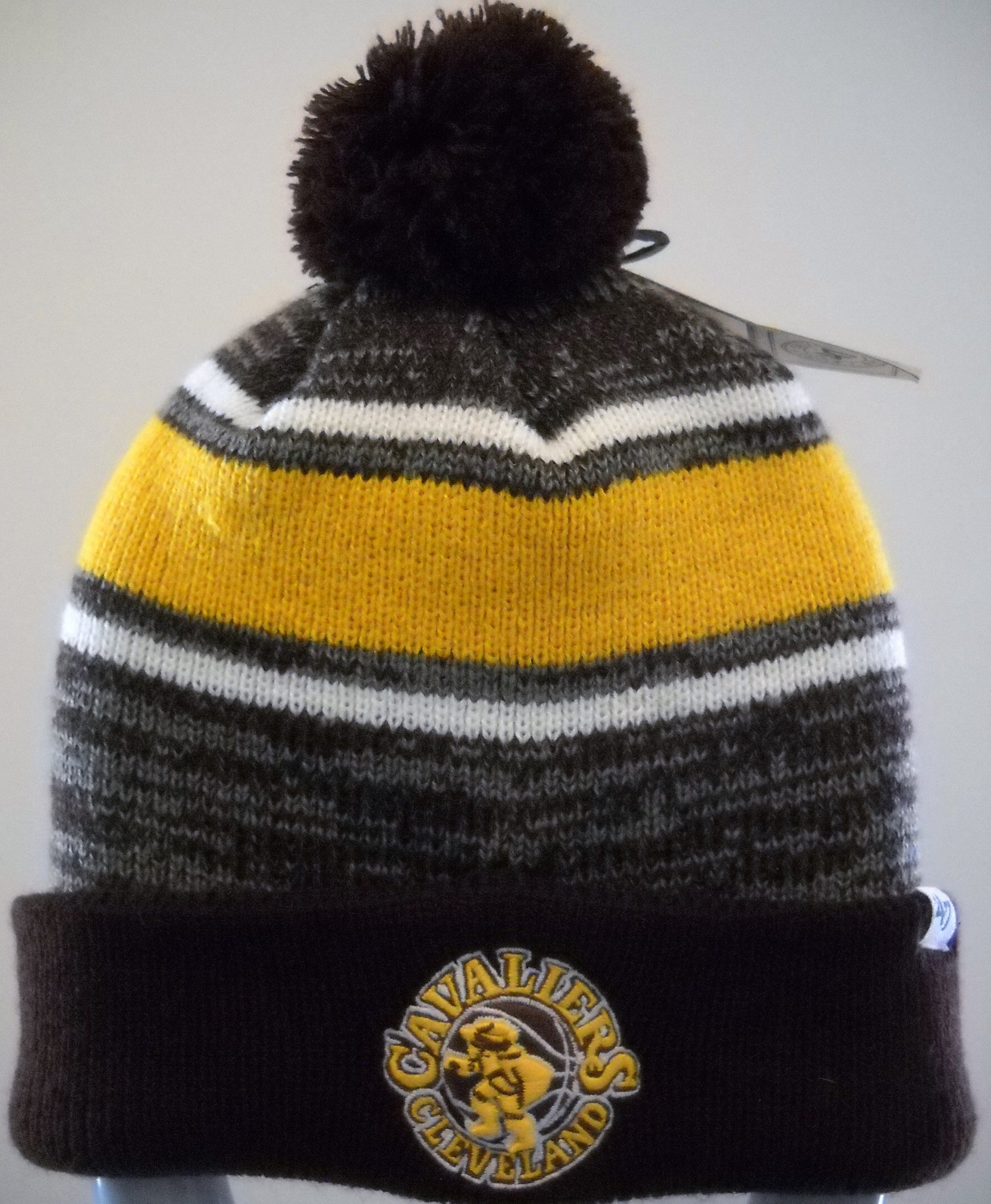 Cleveland Cavaliers Adult Knit Cap Hat Toboggan with Embroidered Circular Logo on Cuff and String Pom Ball on Top