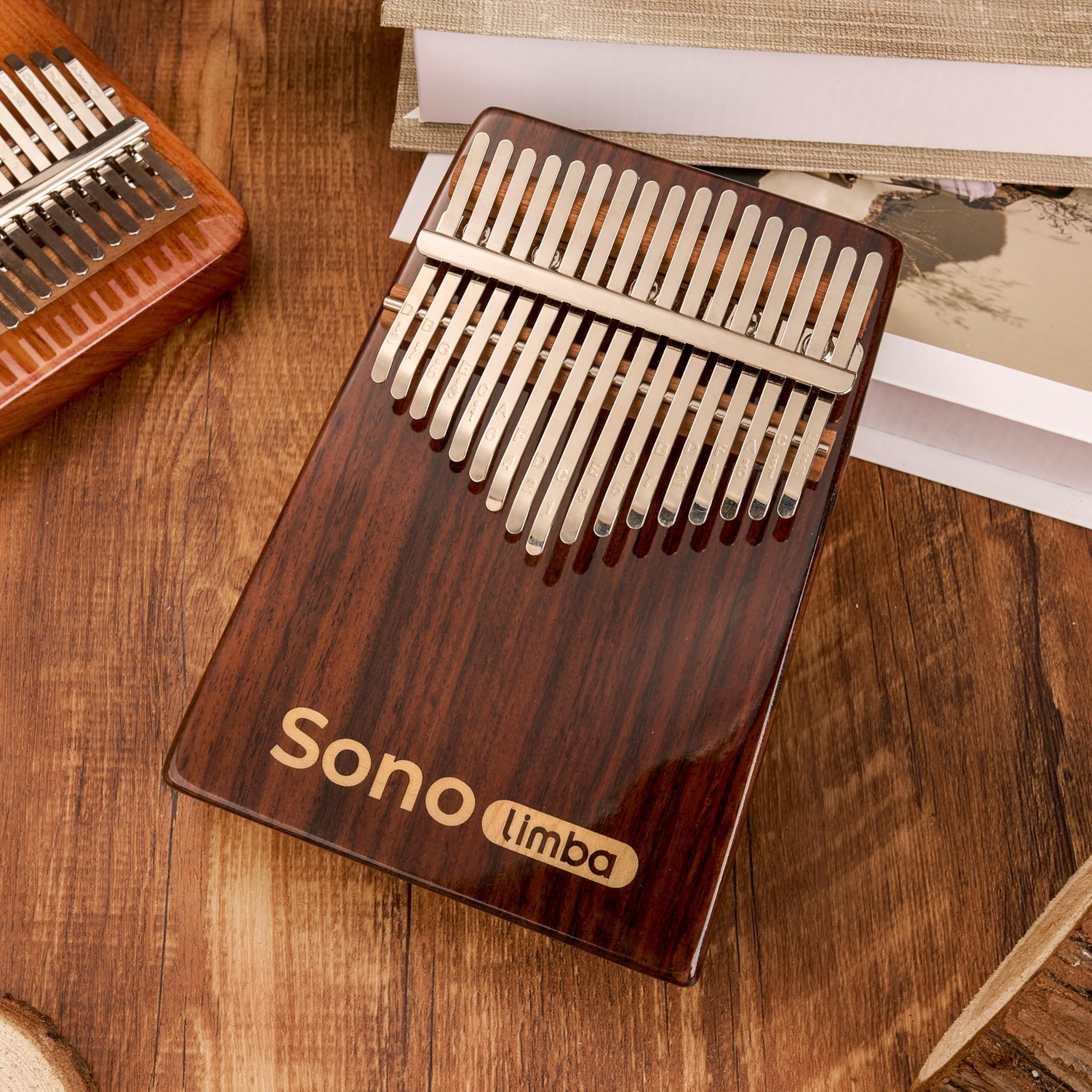 Kalimba avec 17 clés - Piano à pouces en bois de rose de haute qualité. Piano portable avec pochette et livre de chansons. Instrument de musique. Percussion à main pour enfant ou adulte