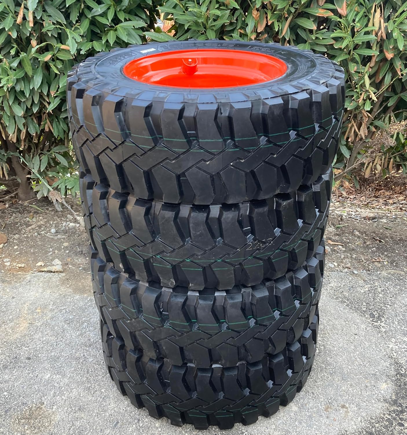 Set of 4-Heavy Duty 10R16.5 Forerunner CST76 All-Steel Radial Skid Steer Tires on Wheels/Rims (8 lug) for Bobcat & more -12PLY -10X16.5