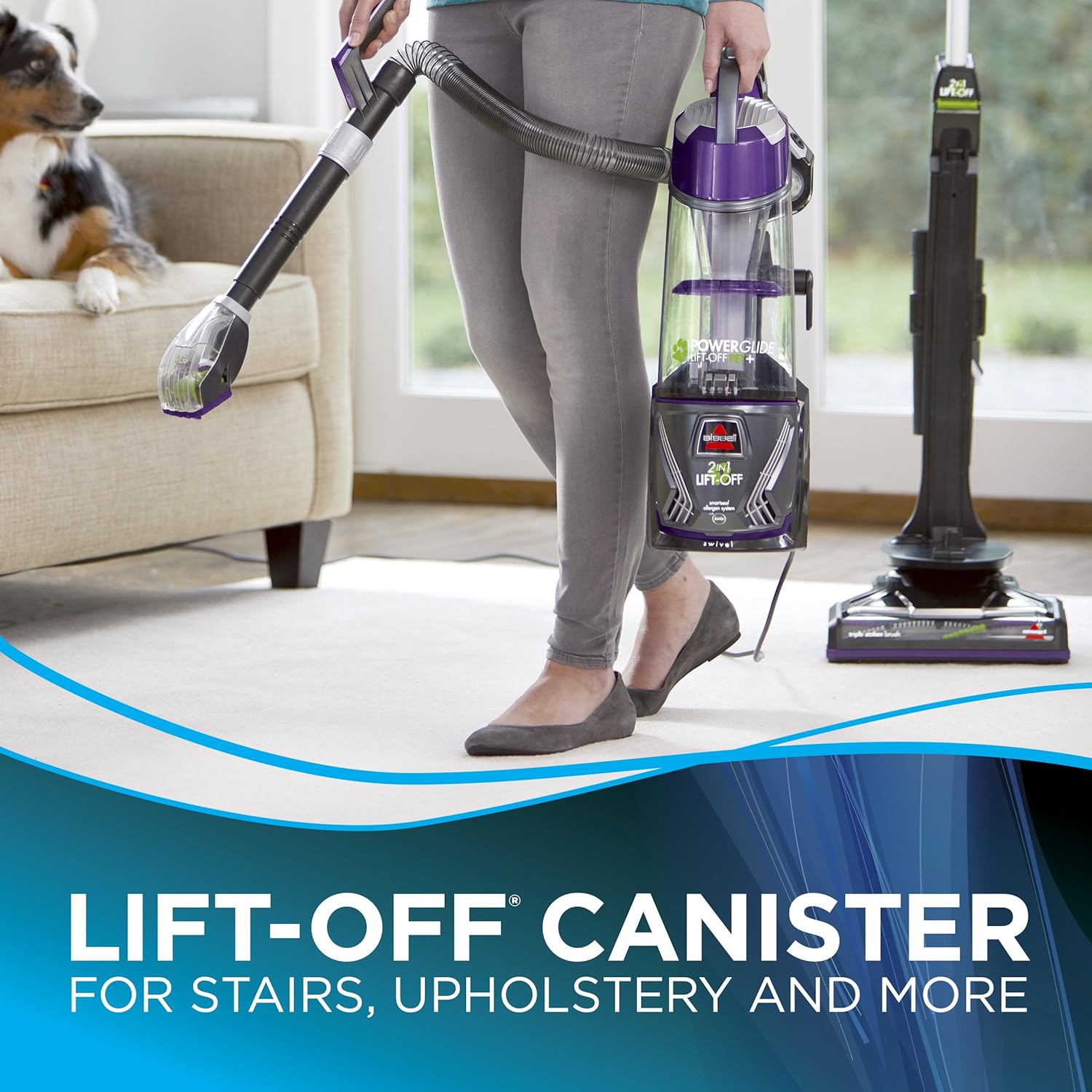 Person using the Bissell PowerGlide Lift-Off Pet Plus vacuum with the canister detached to clean stairs.