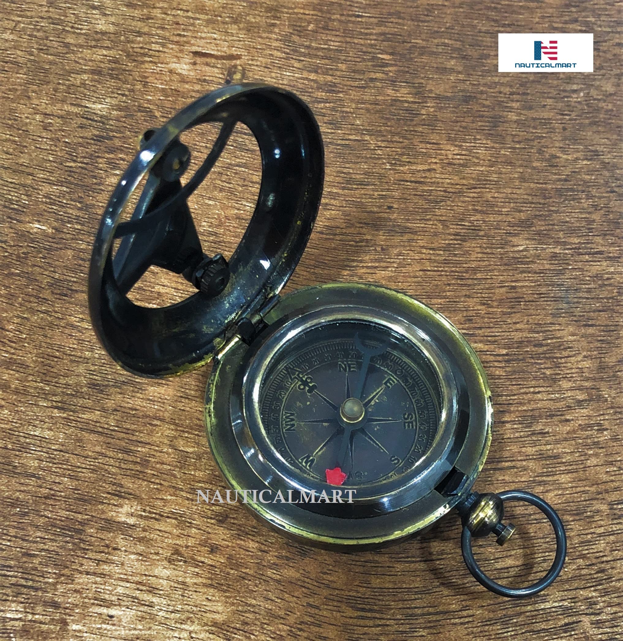 Nauticalmart - Brújula de latón con botón de presión, Antique