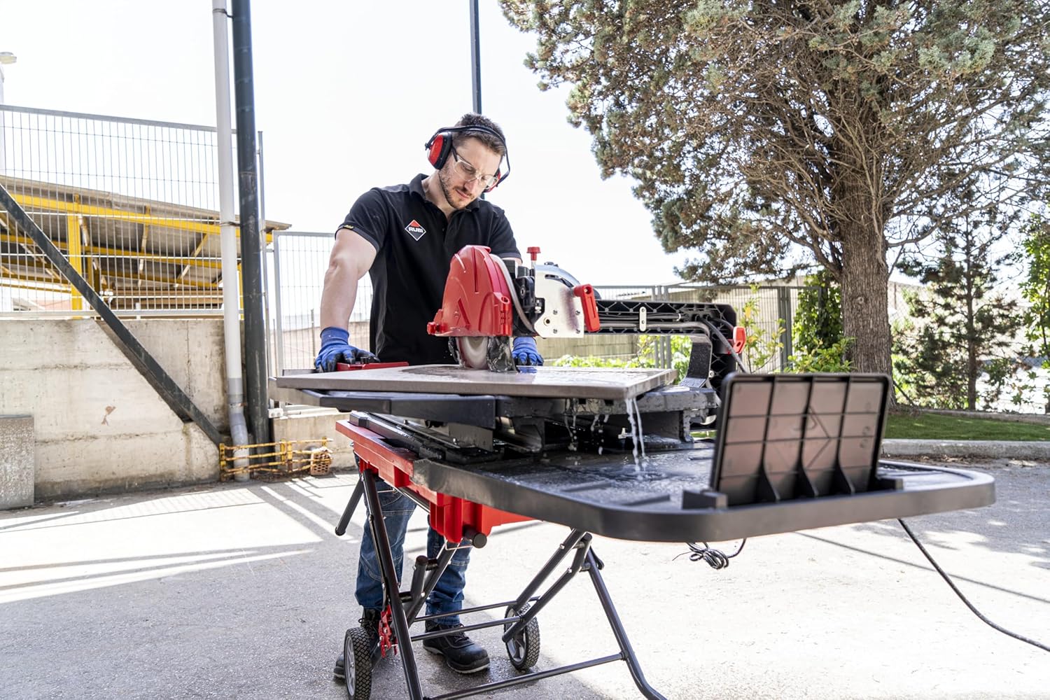 Close-up of operator cutting tile with RUBI DT-10IN Max