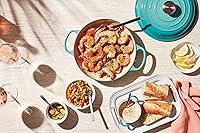 Vista 122 de Le Creuset Signature Cacerola de hierro fundido esmaltado, 3.5 cuartos de galón, color naranja (Flame)