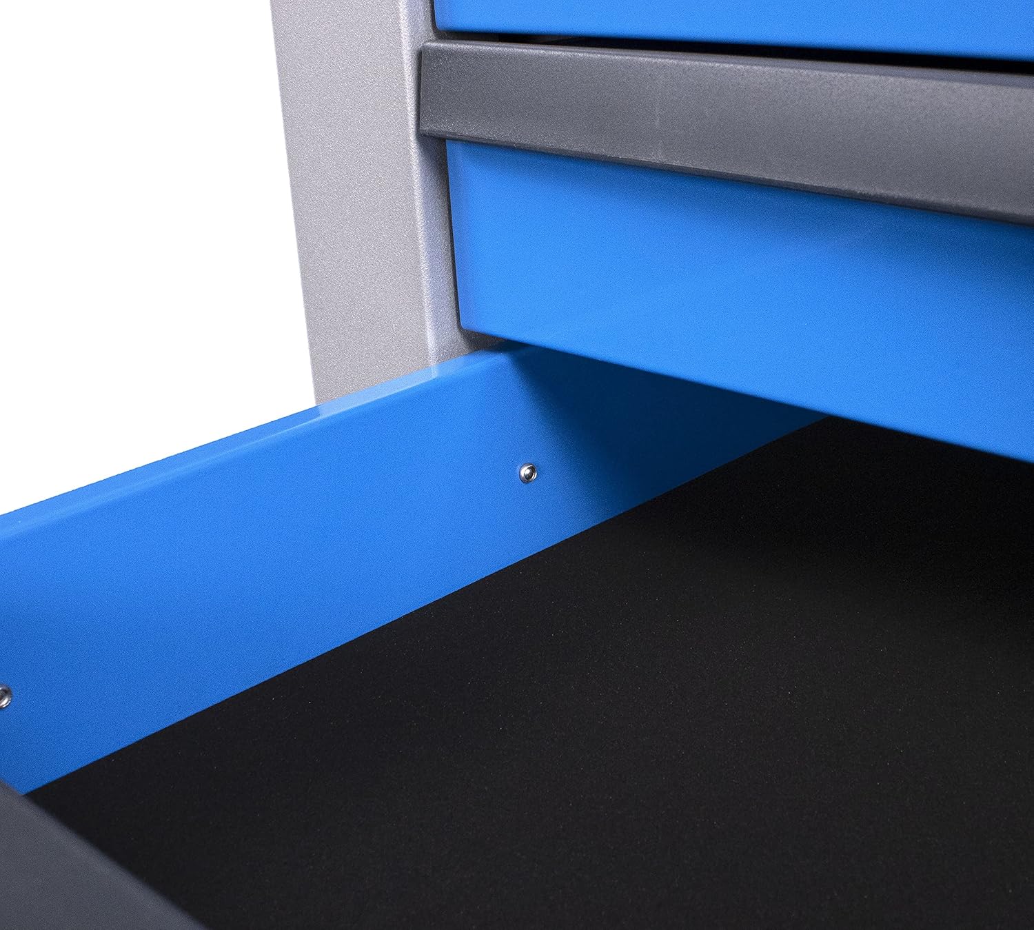 ข้างใน view of a drawer with a black foamed rubber mat, indicating protection for tools.