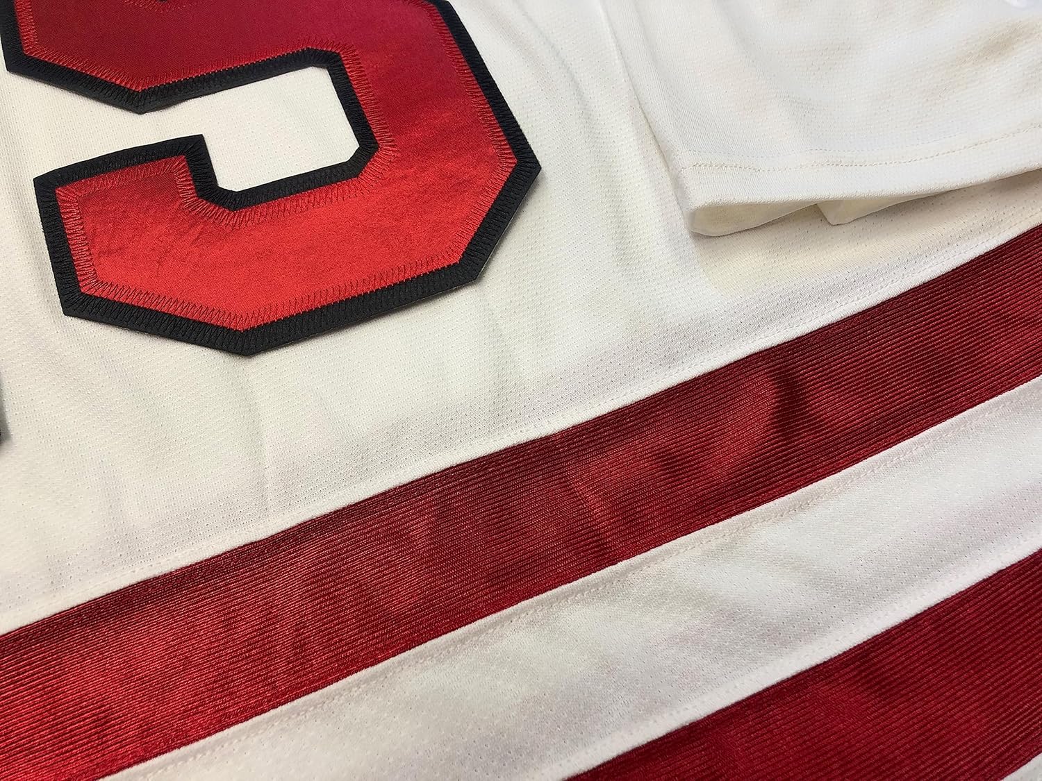 Red and White Hockey Jerseys with a Roadrunners Embroidered Twill Crest