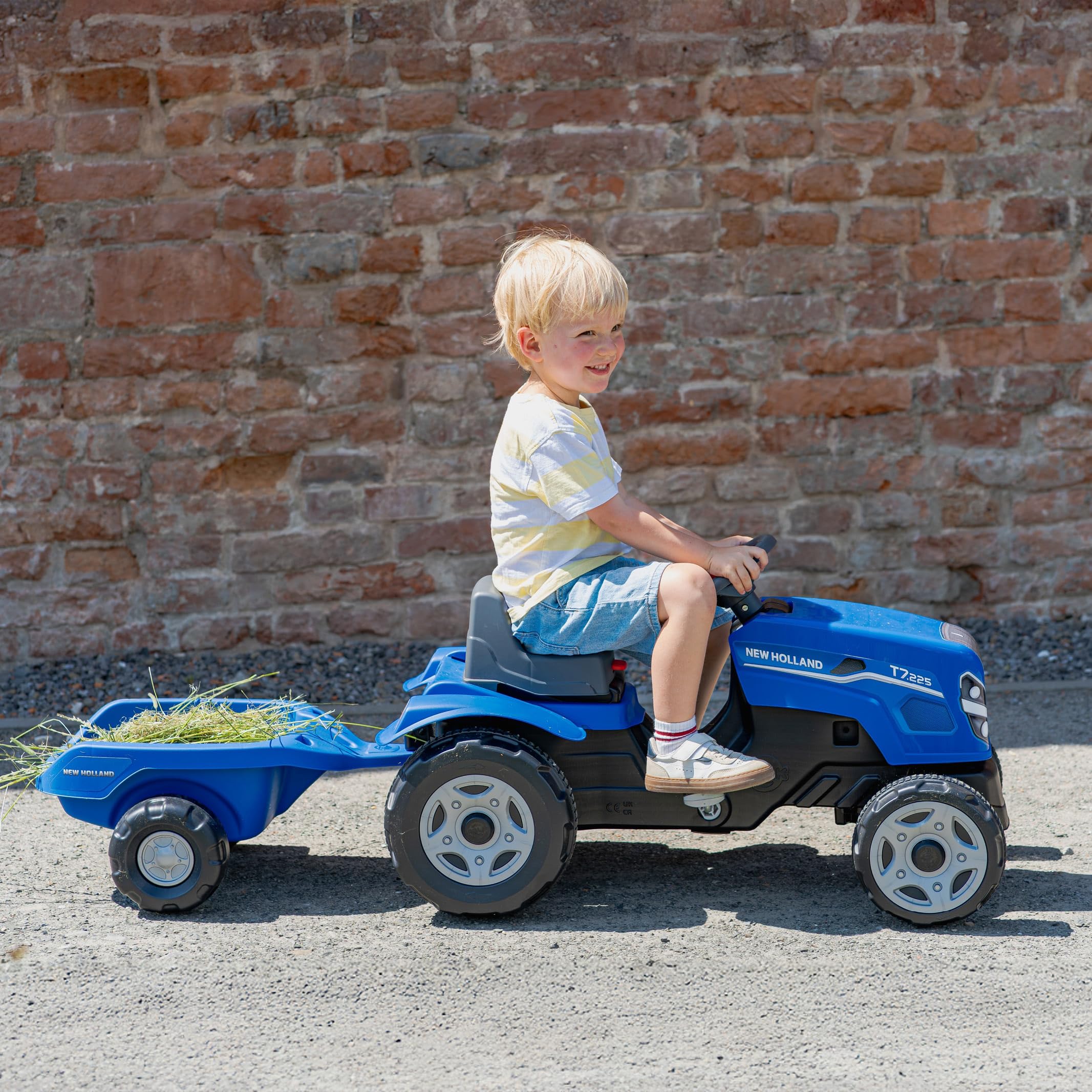 Falk Traktor mit Pedalen New Holland für Kinder, mit Anhänger, ab 2 Jahren | Haube zum Öffnen und verstellbarer Sitz